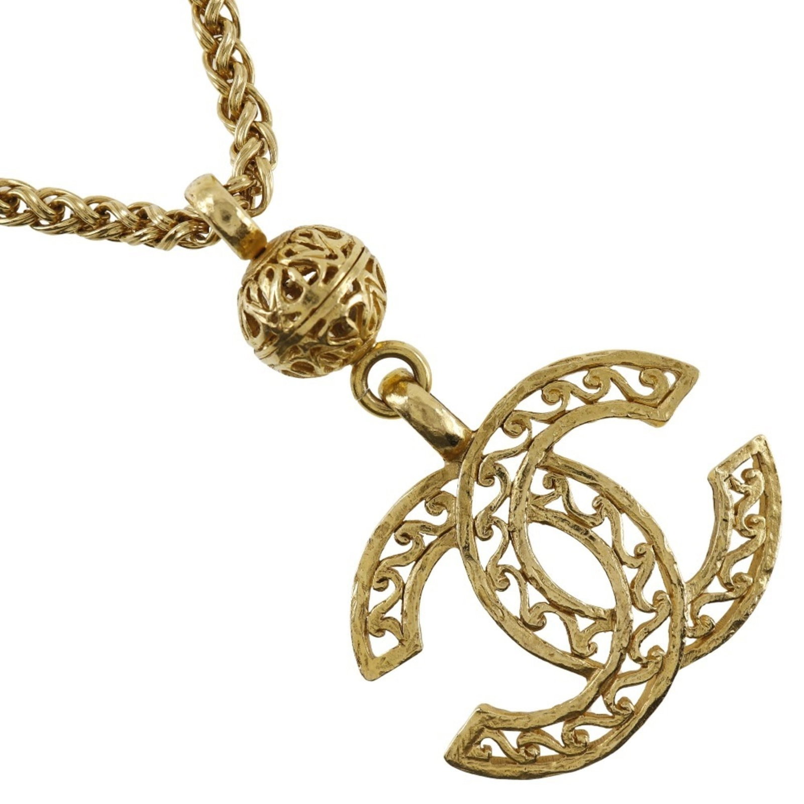 CHANEL Gold France: CHANEL Gold France Gold France by Chanel, a vintage gold necklace featuring a pendant, is a statement piece from France. Weighing 83.4g, this 78cm necklace boasts a 78mm x 51mm pendant, bearing a seri