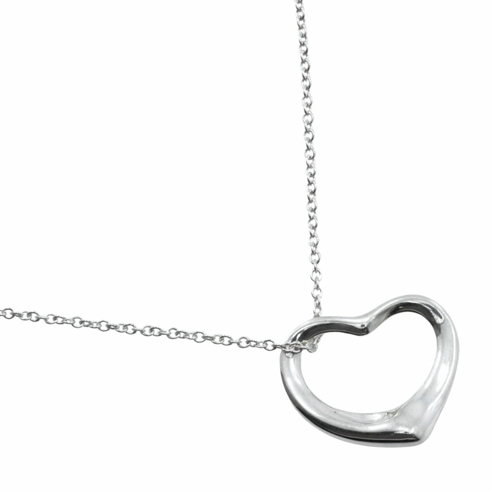 TIFFANY Silver 925: TIFFANY Silver 925 Silver 925 necklace from Tiffany Line, featuring a 25mm x 26mm pendant with a 46.5 cm chain, gently used with minor signs of wear, including small scratches or light marks. The