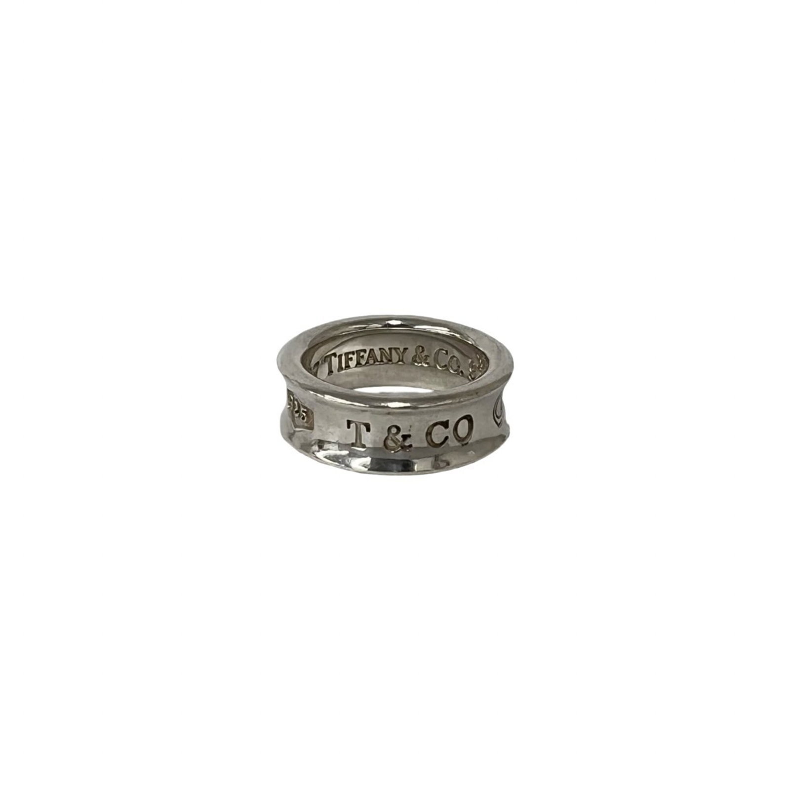 TIFFANY Band Ring Silver 925: TIFFANY Band Ring Silver 925 Silver 925 band ring from Tiffany, a classic design with visible wear and scratches, offering a unique, pre-owned piece. The ring is in good condition, with scuffs and