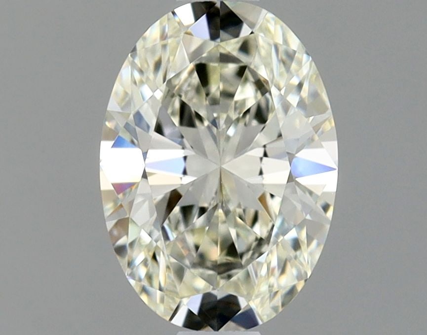 GIA Oval 0.91ct K VVS1 - Loose Natural Diamond: GIA Oval 0.91ct K VVS1 - Loose Natural Diamond GIA Oval 0.91ct K VVS1 - Loose Natural DiamondThis 0.91ct oval-cut diamond boasts exceptional clarity and color, certified by the Gemological Institute