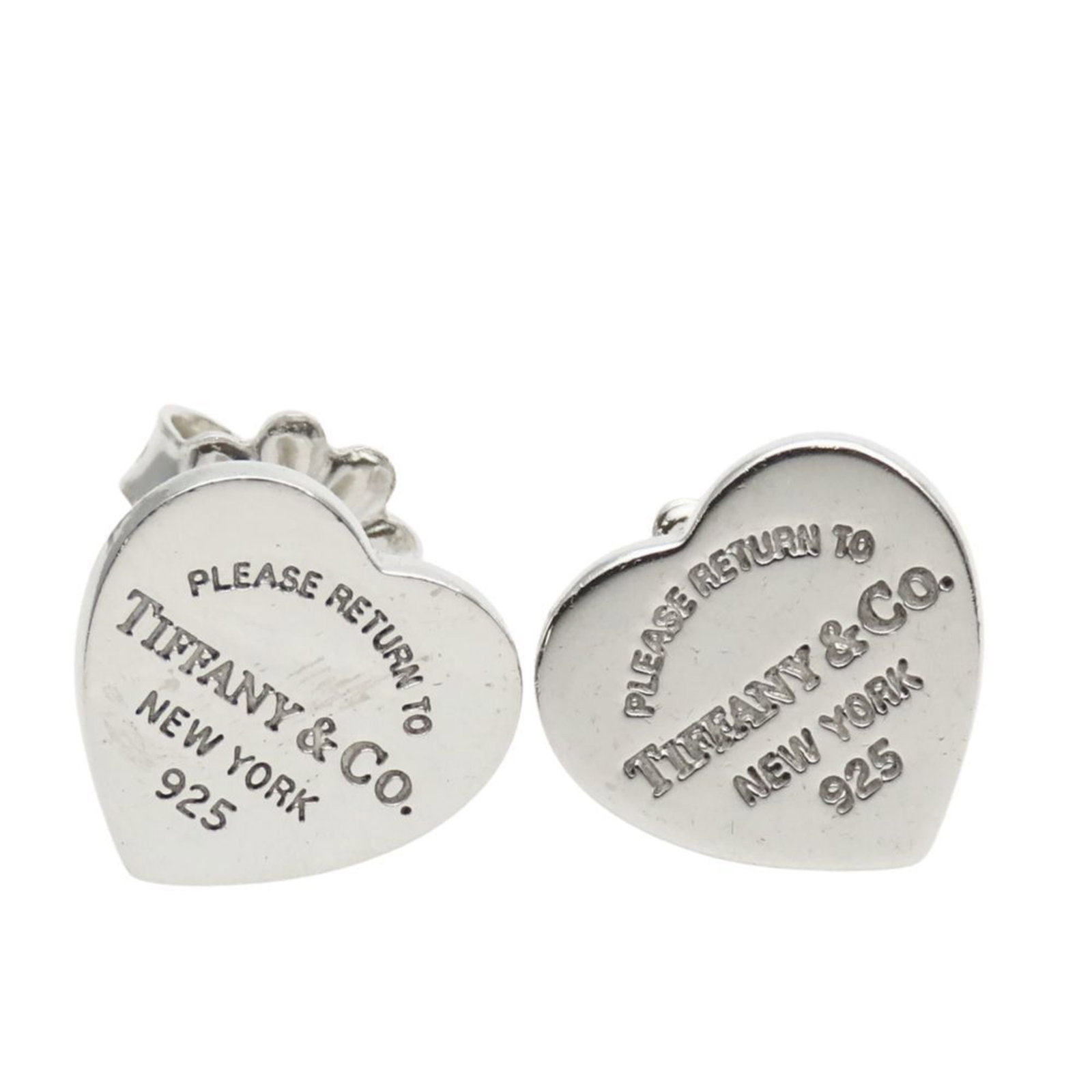 TIFFANY Stud Earrings Silver 925: TIFFANY Stud Earrings Silver 925 Stud earrings featuring a silver 925 design from Tiffany, with a subtle sheen to the metal. The earrings are made from durable silver and have a sleek, understated
