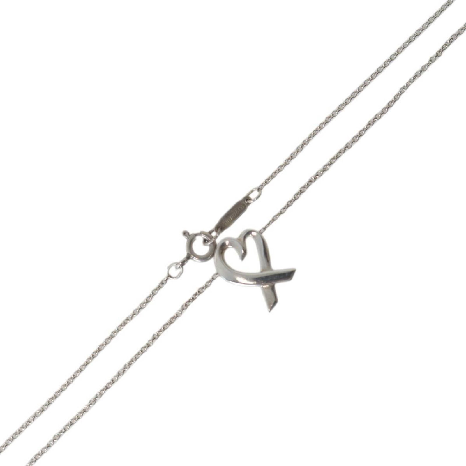 TIFFANY Silver 925: TIFFANY Silver 925 Silver 925 Tiffany Necklace in Good Condition. This 42cm necklace features a 14.5mm x 10.1mm silver pendant, bearing a visible signature. With its scratches and scuffs, this piece
