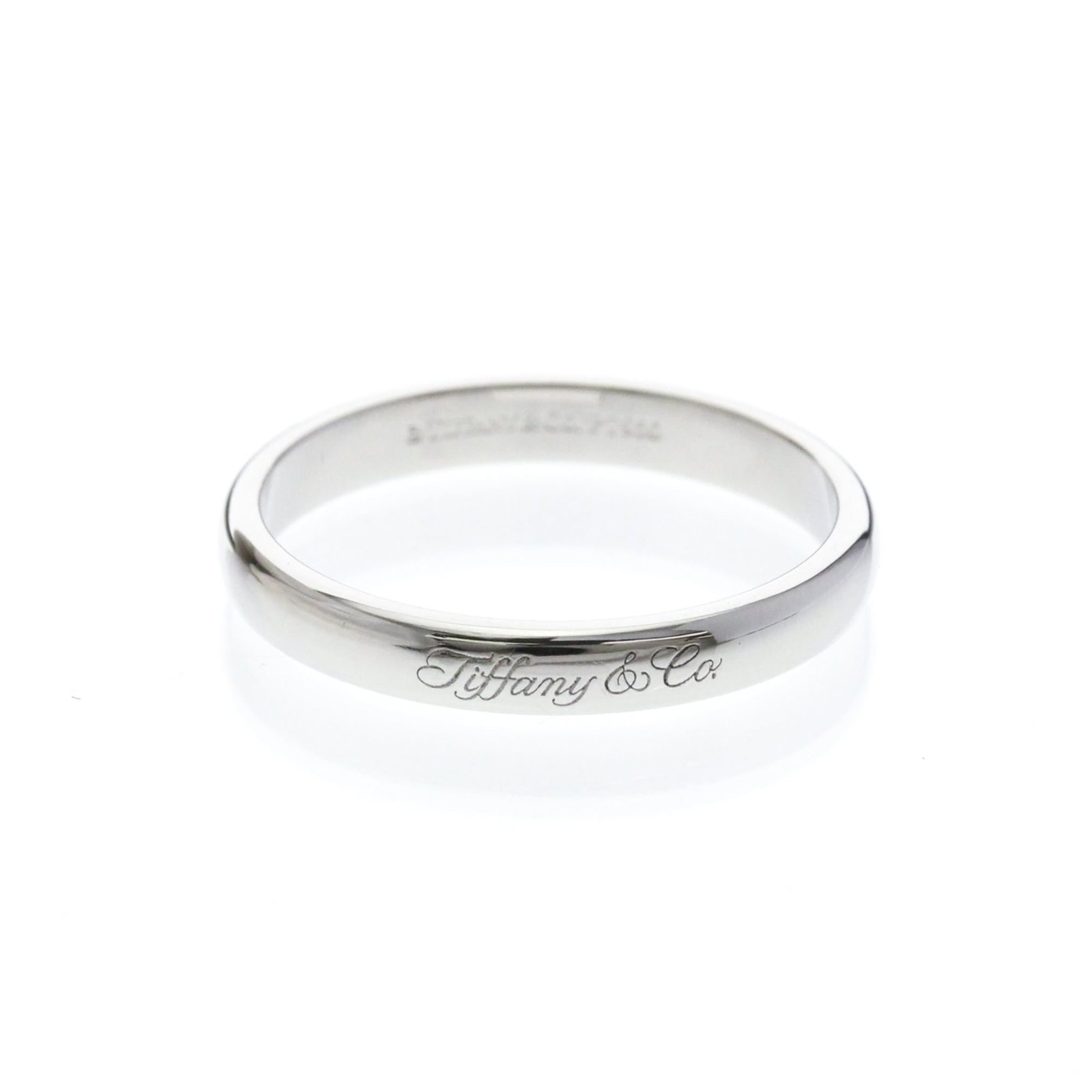 TIFFANY Band Ring Platinum: TIFFANY Band Ring Platinum Tiffany's iconic band ring in platinum, a timeless fashion statement. This 8.5 US size ring features a sleek 3.2mm width and weighs 5.5g, making it a stylish addition to any