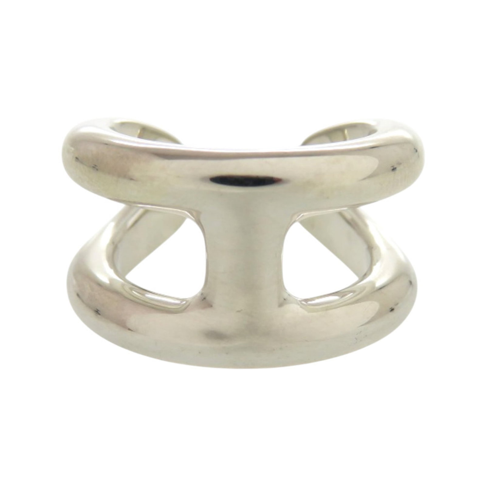 HERMES Band Ring Silver 925: HERMES Band Ring Silver 925 Silver 925 band ring from Hermes, made in Italy, features a sleek and modern design. This like new used ring boasts excellent condition with no visible wear, making it a gr