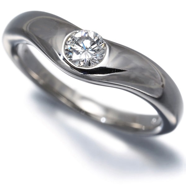 Tiffany&Co. Ring Diamond Curved Band 1P Us5 950 Platinum: Tiffany&Co. Ring Diamond Curved Band 1P Us5 950 Platinum Tiffany & Co.'s 1P Us5 950 Platinum ring boasts a stunning curved band, adorned with a natural diamond of approximately 0.2ct in diameter, 3.8m