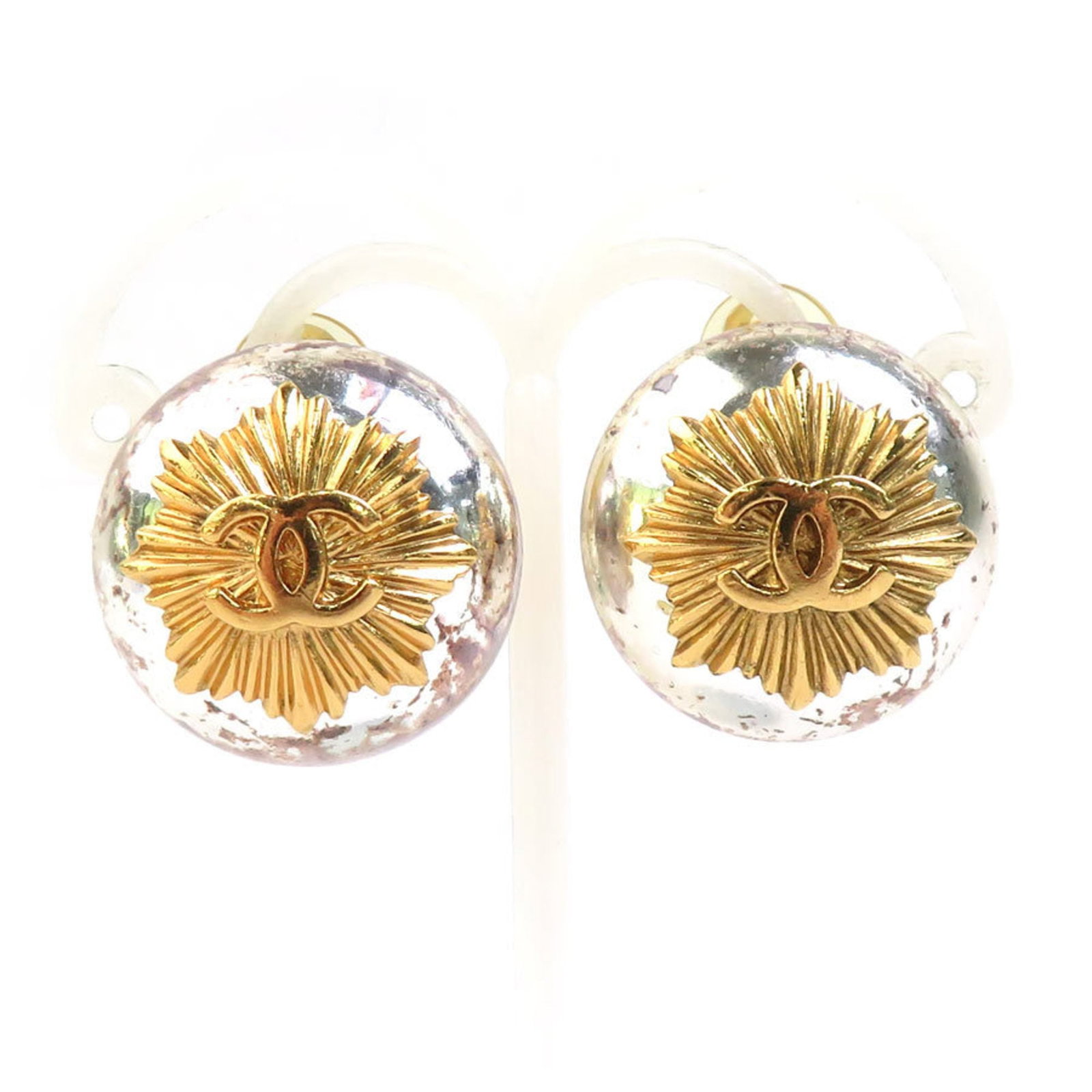CHANEL Clip Earrings Metal: CHANEL Clip Earrings Metal Gold and Silver Clip Earrings by CHANEL. Made from metal, these clip earrings feature a diameter of 22mm and are available in both gold and silver colors. They are in good u