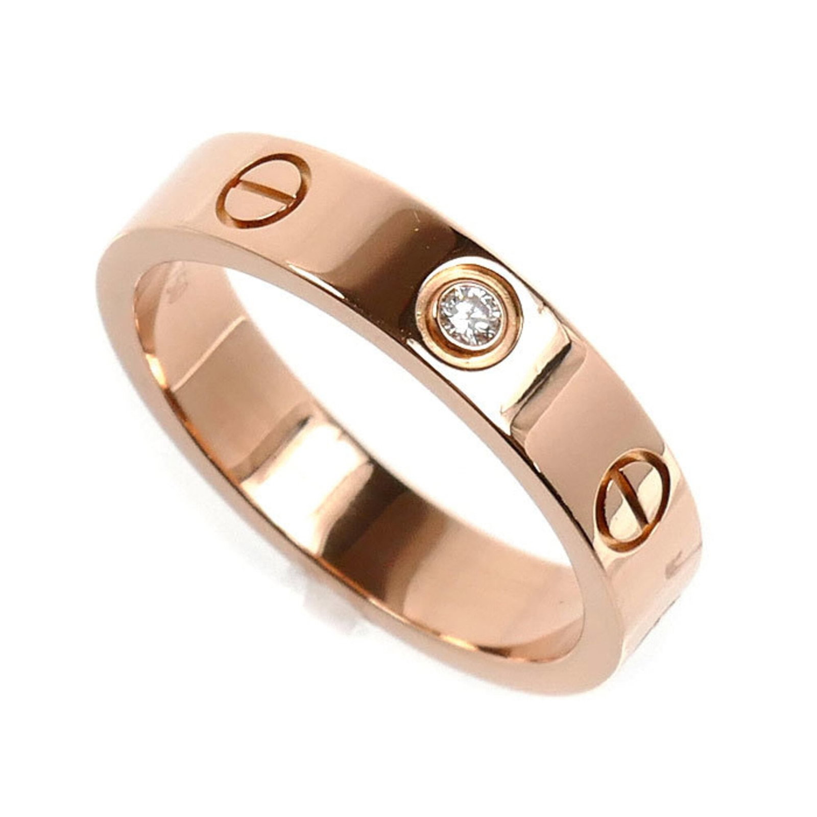 CARTIER Band Ring Pink Gold (18K): CARTIER Band Ring Pink Gold (18K) Pink gold (18K) band ring from Cartier, featuring a diamond stone. This 18K pink gold band ring is a classic design from the French luxury brand, bearing a signature.