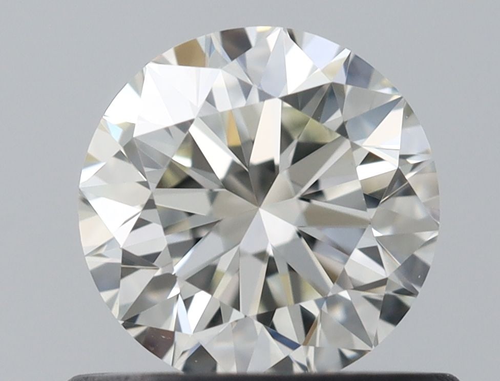 IGI Round 0.6ct I VVS2 - Loose Natural Diamond: IGI Round 0.6ct I VVS2 - Loose Natural Diamond 0.6ct I VVS2 - A Natural Diamond of Exceptional Clarity and Cut. This IGI-certified, EX-cut diamond boasts an impressive EX polish and symmetry, making