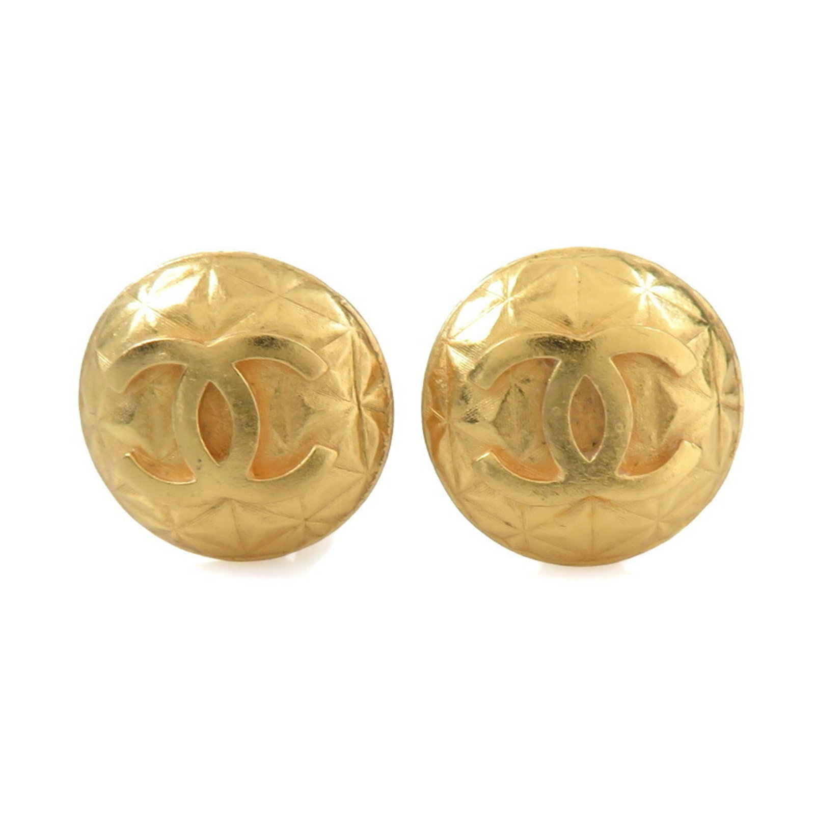 CHANEL Clip Earrings Metal: CHANEL Clip Earrings Metal Gold Clip Earrings from Chanel, bearing visible scratches and scuffs, are a testament to their well-worn charm. Made from metal, these clip earrings showcase the iconic desi
