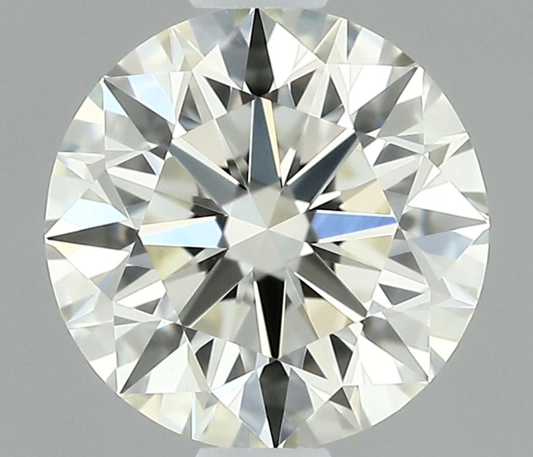 IGI Round 0.73ct K IF - Loose Natural Diamond: IGI Round 0.73ct K IF - Loose Natural Diamond 0.73ct K IF - A Natural Diamond of Exceptional Clarity and Cut. This IGI-certified, loose natural diamond boasts an impressive clarity grade of IF, with