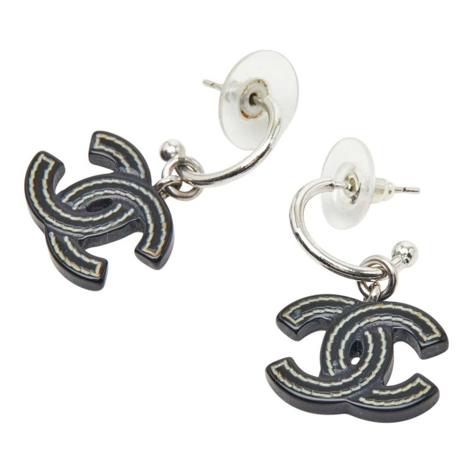 CHANEL Stud Earrings Metal Plastic: CHANEL Stud Earrings Metal Plastic Black and silver stud earrings from CHANEL, featuring a metal and plastic design. The earrings have visible scratches and scuffs, but remain fully functional in