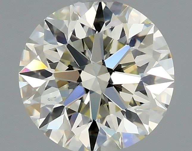 IGI Round 0.9ct K VVS2 - Loose Natural Diamond: IGI Round 0.9ct K VVS2 - Loose Natural Diamond The IGI Round 0.9ct K VVS2 is a stunning loose natural diamond, certified by the International Gemological Institute (IGI). Its exceptional clarity and