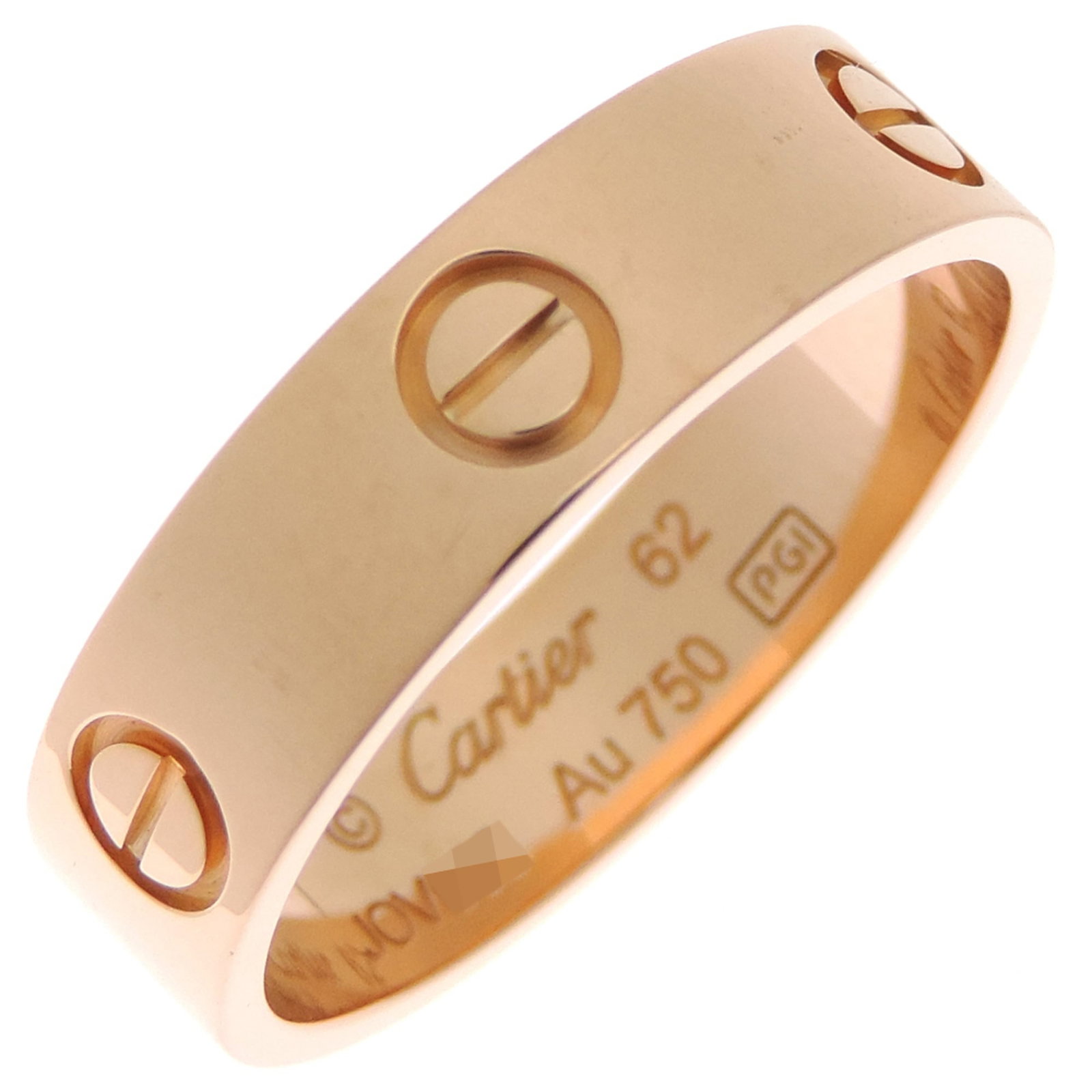 CARTIER Band Ring Pink Gold (18K): CARTIER Band Ring Pink Gold (18K) Pink gold (18K) Cartier band ring in excellent condition, featuring a subtle pink hue and minor signs of wear. The ring bears a signature, a hallmark of Cartier's