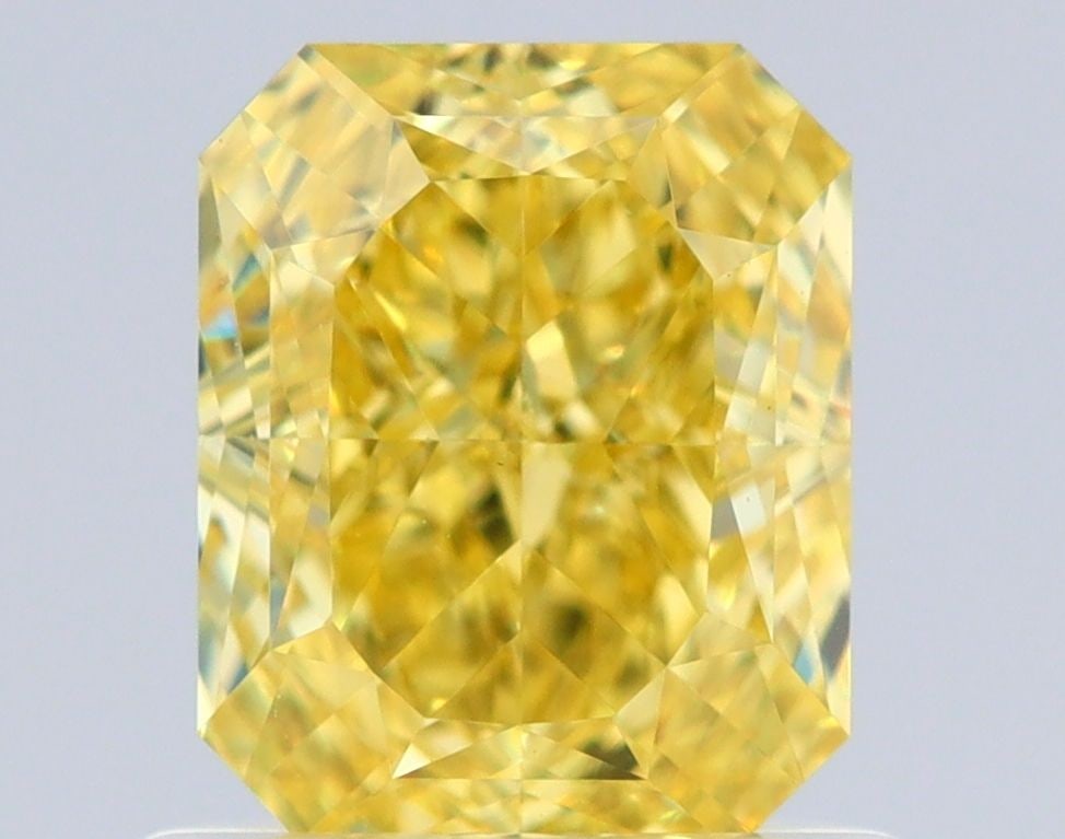 GIA Radiant 1.01ct Fancy Vivid Yellow VVS1 - Loose Natural Diamond: GIA Radiant 1.01ct Fancy Vivid Yellow VVS1 - Loose Natural Diamond GIA-certified, this 1.01ct Fancy Vivid Yellow VVS1 diamond boasts exceptional color and clarity, with a high polish and near-perfect
