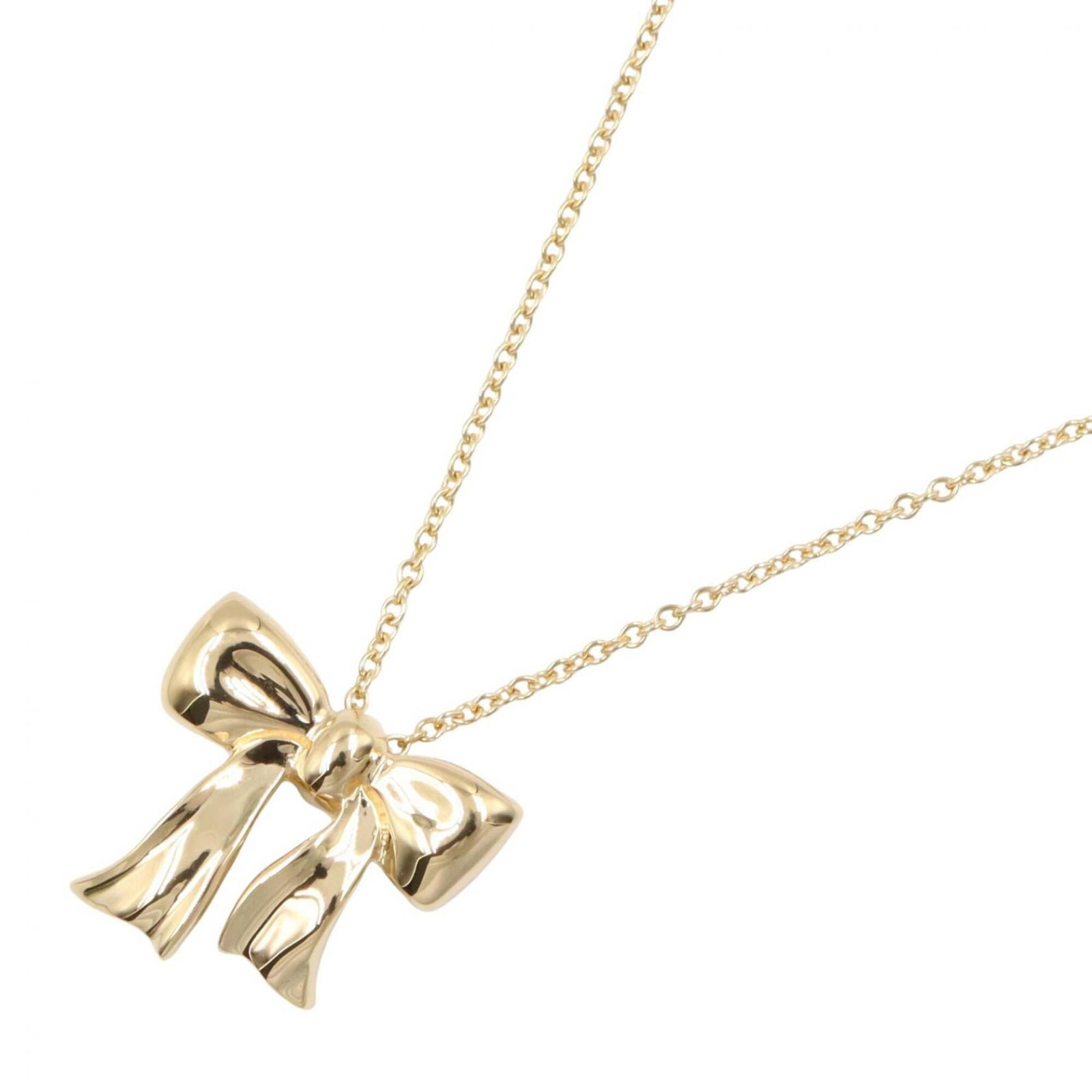 TIFFANY Yellow Gold (18K): TIFFANY Yellow Gold (18K) Yellow gold (18K) Tiffany necklace, featuring a 14mm x 15mm pendant, is available. Gently used with minor signs of wear, the necklace has a 46 cm circumference and is made fr