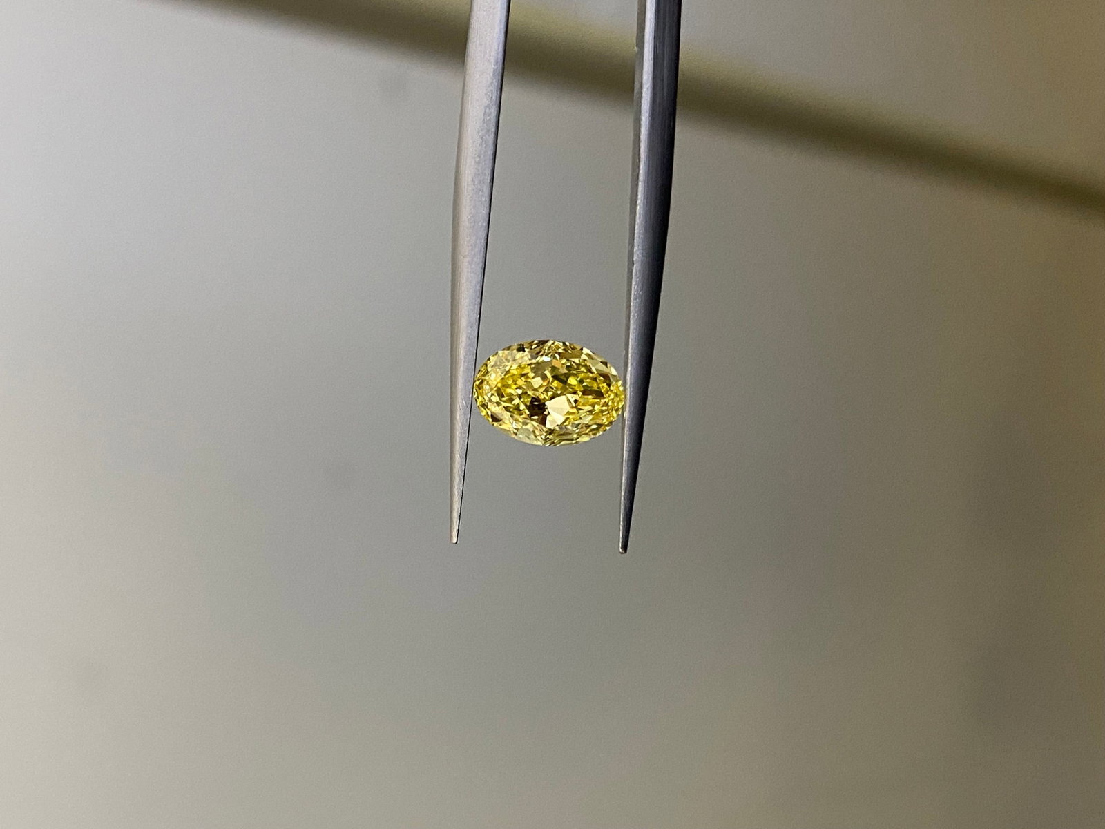 GIA Oval 1.46ct Fancy Vivid Yellow VVS2 - Loose Natural Diamond: GIA Oval 1.46ct Fancy Vivid Yellow VVS2 - Loose Natural Diamond GIA Oval 1.46ct Fancy Vivid Yellow VVS2 - Loose Natural Diamond. This stunning 1.46 carat Fancy Vivid Yellow diamond boasts exceptional