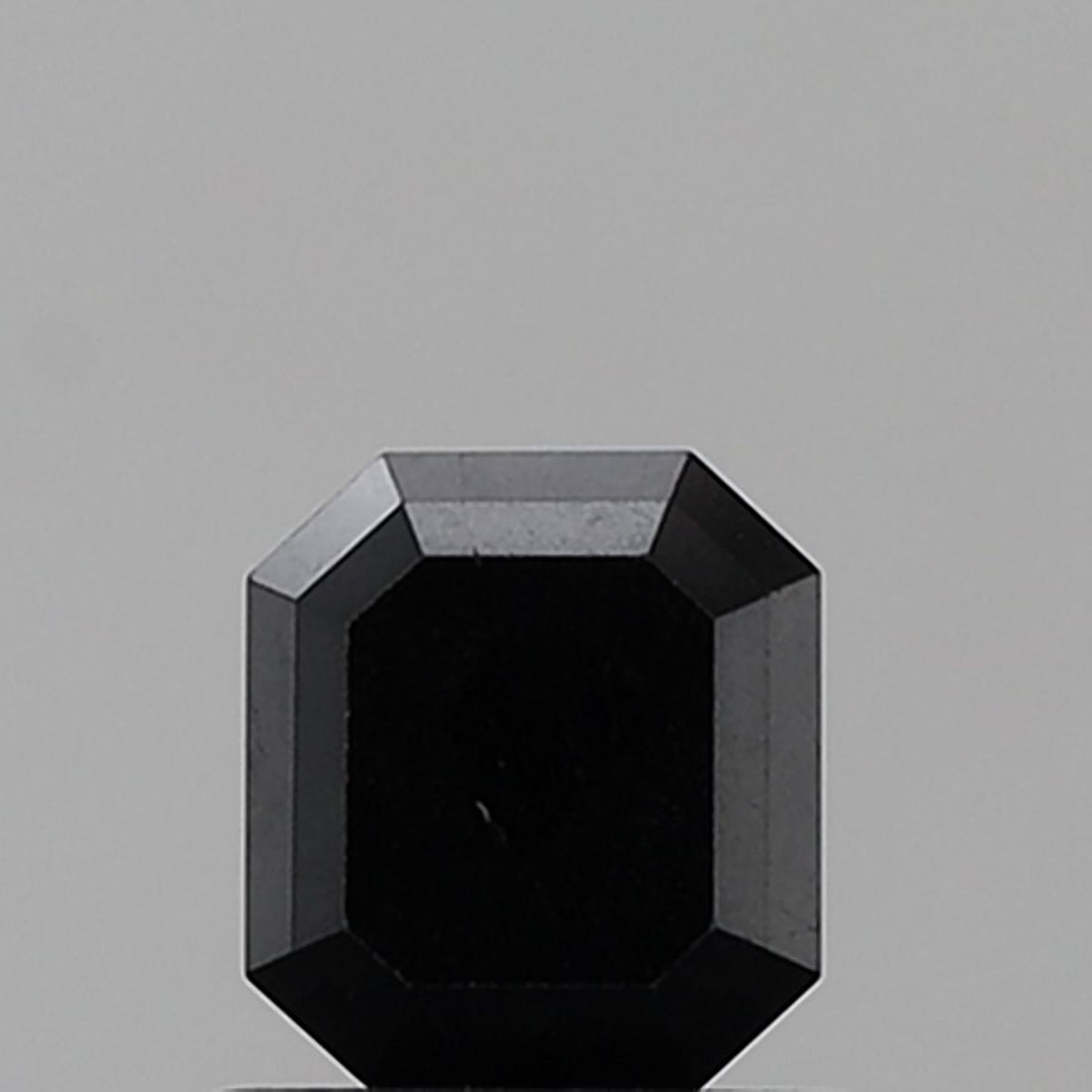 Emerald 0.93ct Black VVS2 - Loose Natural Diamond: Emerald 0.93ct Black VVS2 - Loose Natural Diamond 0.93ct Black VVS2 - Loose Natural DiamondThe 0.93ct black diamond boasts exceptional clarity, with a VVS2 grade indicating minimal inclusions. Its EX