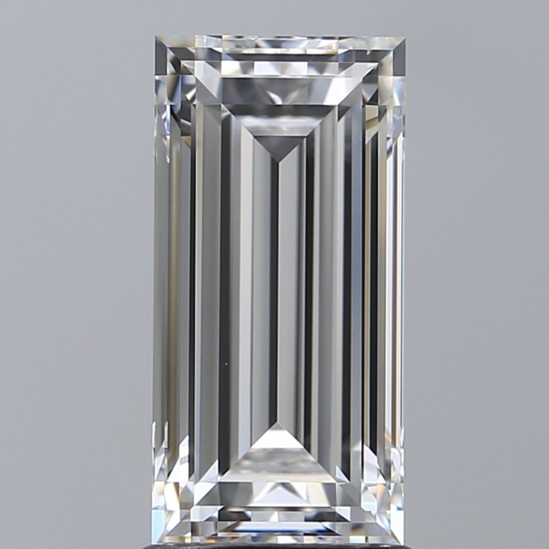 GIA Baguette 2.01ct E VVS1 - Loose Natural Diamond: GIA Baguette 2.01ct E VVS1 - Loose Natural Diamond GIA certified 2.01ct E VVS1 diamond, cut to its natural shape, boasts an EX polish and symmetry. This exceptional stone is certified by the