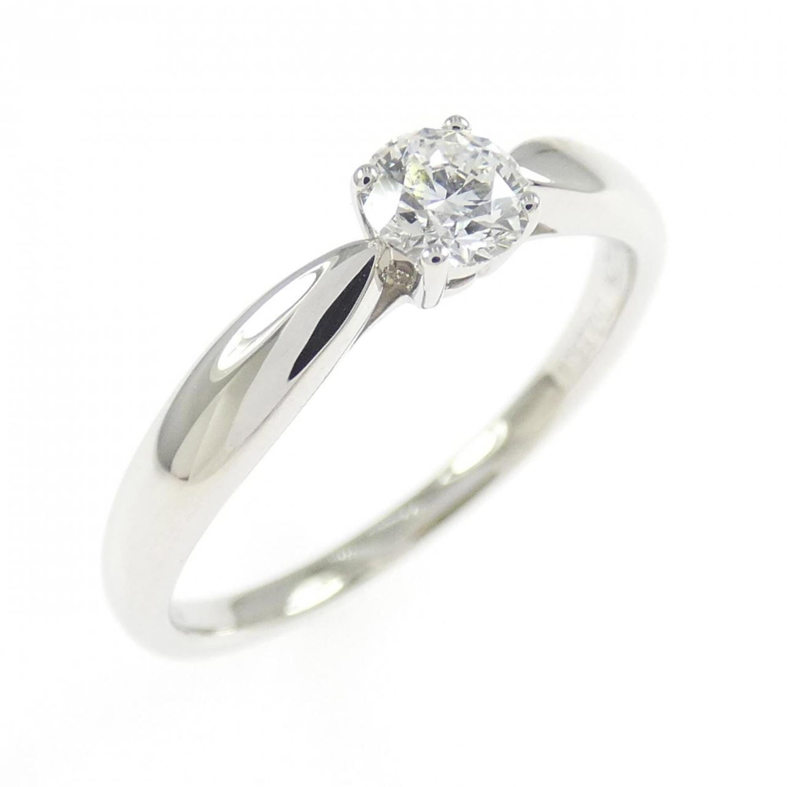 TIFFANY Band Ring Platinum 950: TIFFANY Band Ring Platinum 950 Platinum 950 band ring from Tiffany, featuring a 0.23ct diamond of color grade E and clarity VS1, set in a 3.8mm wide band with a US size 5 fit. This gently used ring sh