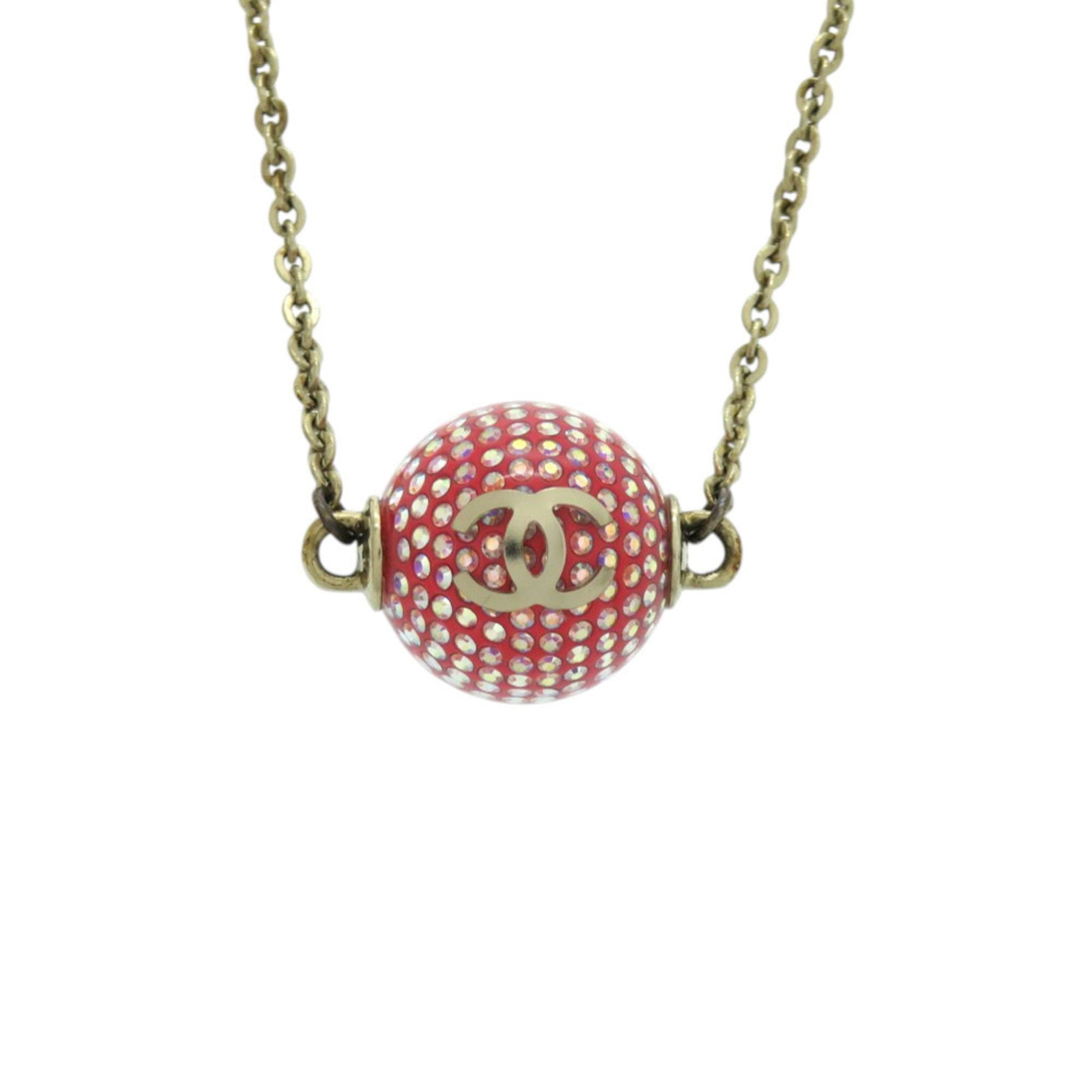 CHANEL Metal Gold Red Color: CHANEL Metal Gold Red Color Metal gold red color from iconic French brand CHANEL, this necklace boasts a striking red hue and elegant ball chain design. The 38cm chain features a 17mm x 18mm
