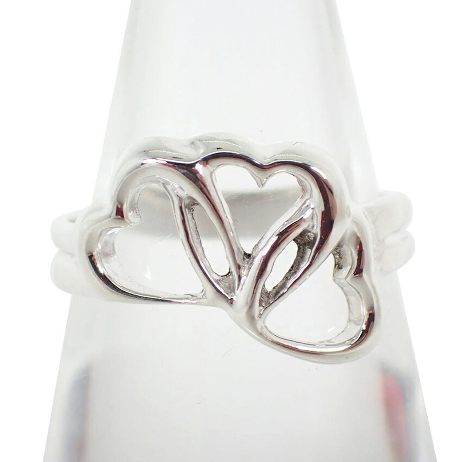 TIFFANY Band Ring Sterling Silver 925: TIFFANY Band Ring Sterling Silver 925 Sterling silver 925 band ring from Tiffany, a classic design with a timeless appeal. The ring features a subtle band with a small scratch or light mark, but