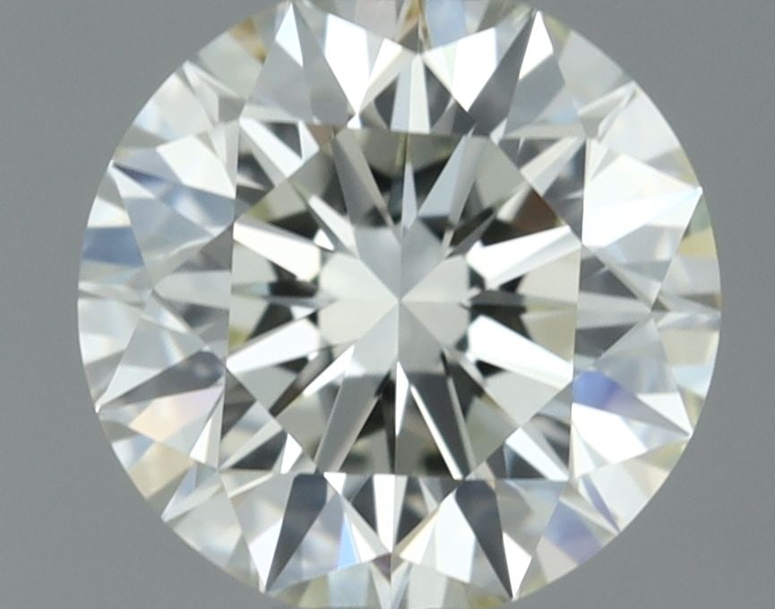 IGI Round 0.6ct K VVS1 - Loose Natural Diamond: IGI Round 0.6ct K VVS1 - Loose Natural Diamond 0.6ct IGI Round K VVS1 Diamond - A Natural Gemstone of Exceptional Clarity and Brilliance. This EX-cut diamond boasts a K color grade, indicating a high