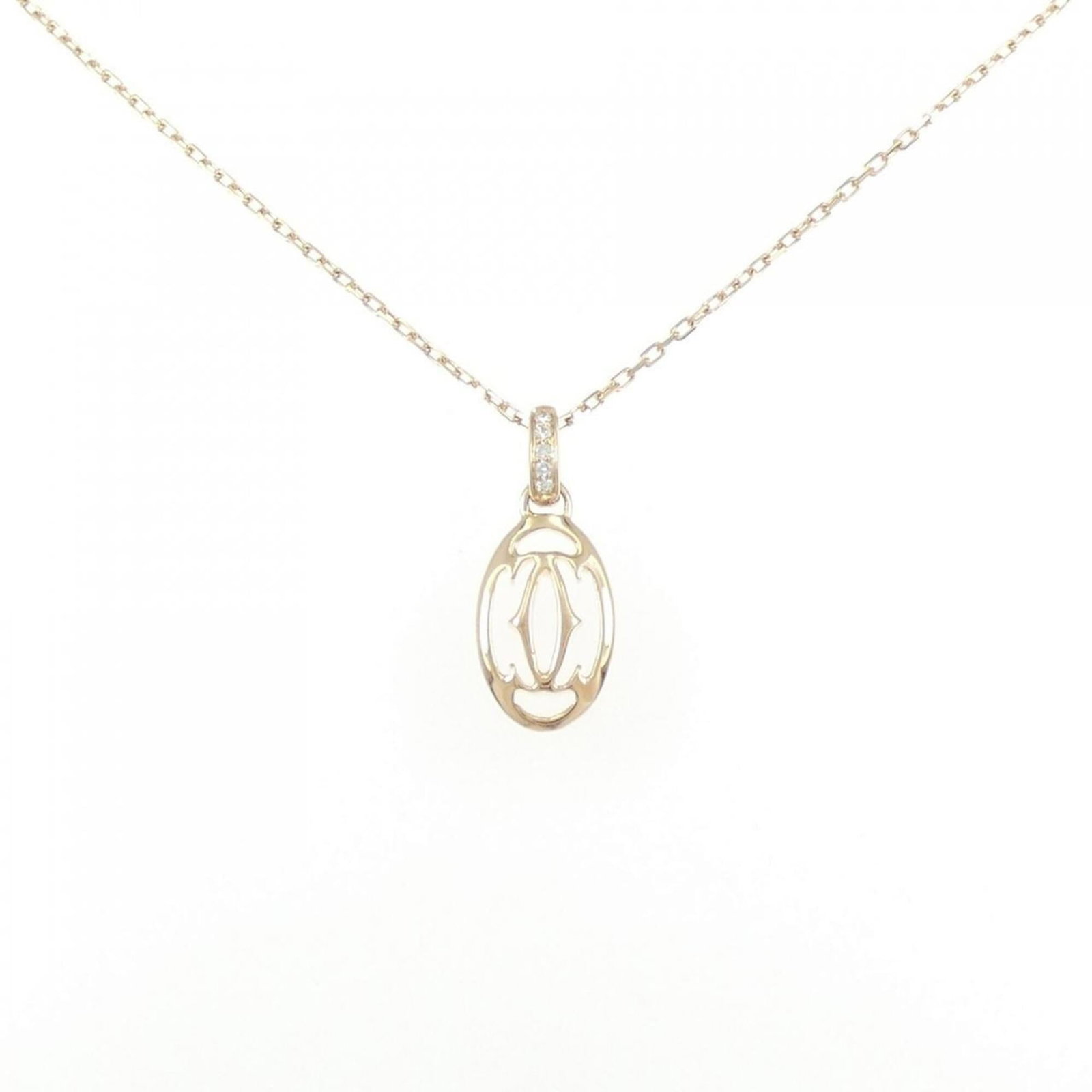 CARTIER Pink Gold (18K): CARTIER Pink Gold (18K) Pink gold (18K) Cartier necklace pendant, 22mm x 9.2mm, 38 cm - 42 cm adjustable neck circumference, bears a signature. In like new condition with only the faintest traces of