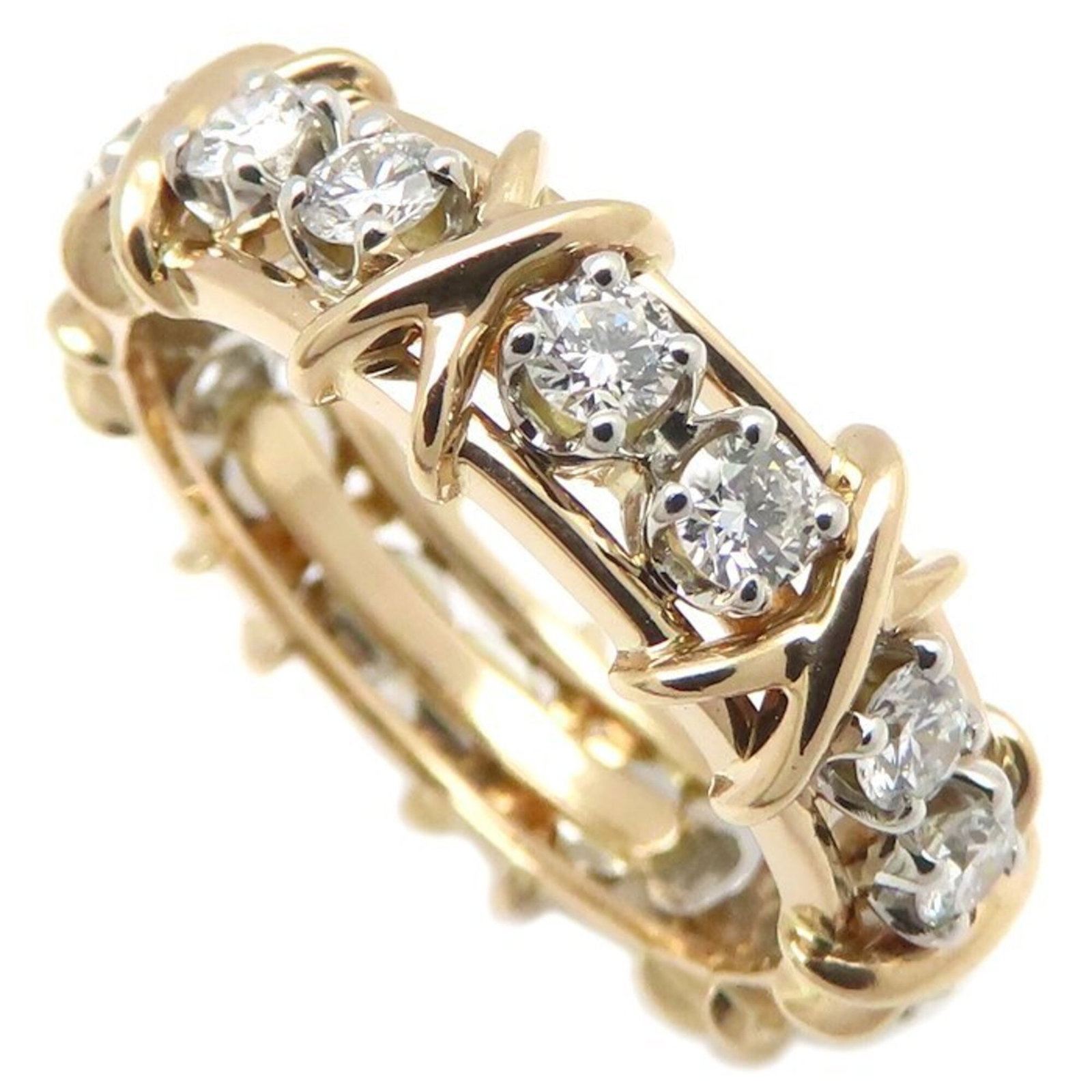 TIFFANY Band Ring Platinum 900 Rose Gold (18K): TIFFANY Band Ring Platinum 900 Rose Gold (18K) Tiffany's iconic 18K rose gold band ring features a diamond stone, set in a platinum 900 band, creating a timeless and elegant design. This gently used r