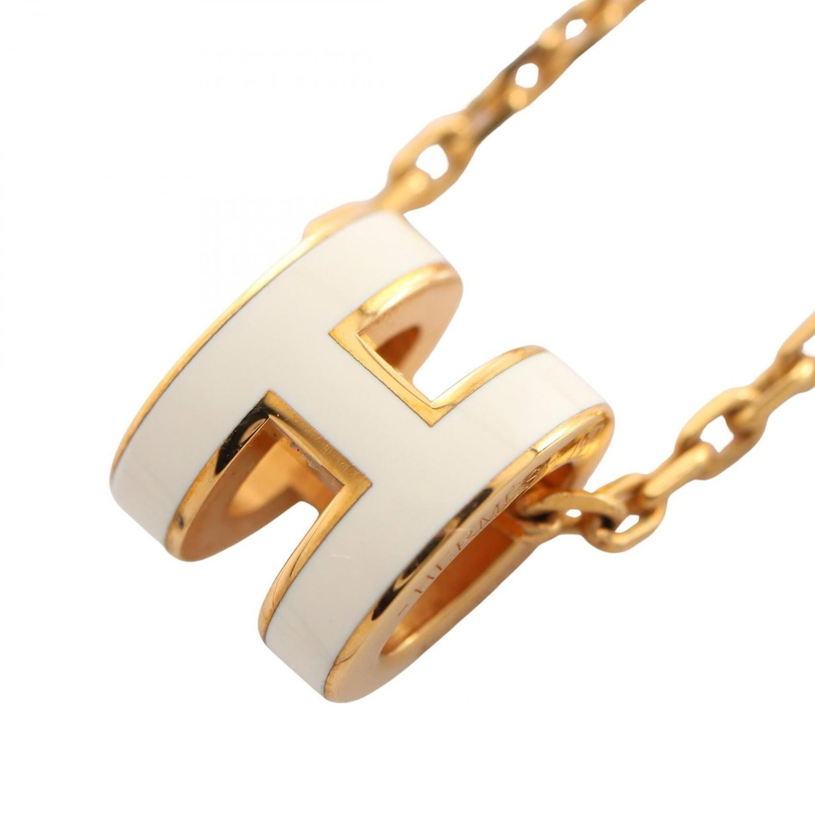 HERMES Gold Plating: HERMES Gold Plating Gently used Hermes Gold Plating necklace with a 40 cm chain, featuring a 9mm x 7mm gold plating pendant. The necklace has minor signs of wear, including small scratches or light ma