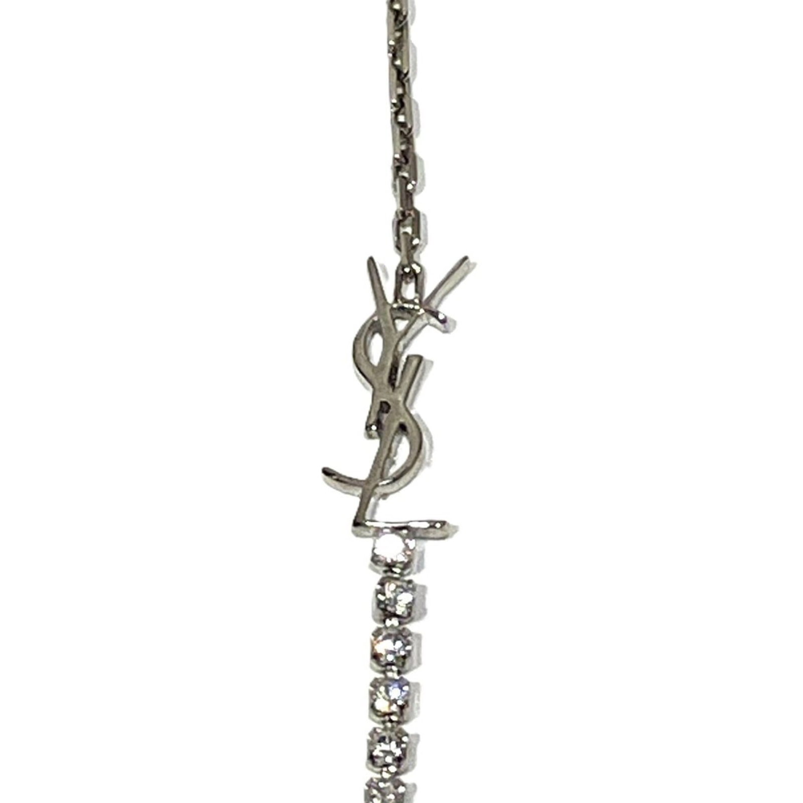 SAINT LAURENT Charm Bracelet Metal Rhinestone: SAINT LAURENT Charm Bracelet Metal Rhinestone Silver Charm Bracelet with Metal and Rhinestone Details, 17cm Length. This Saint Laurent charm bracelet features metal and rhinestone details, adding a to