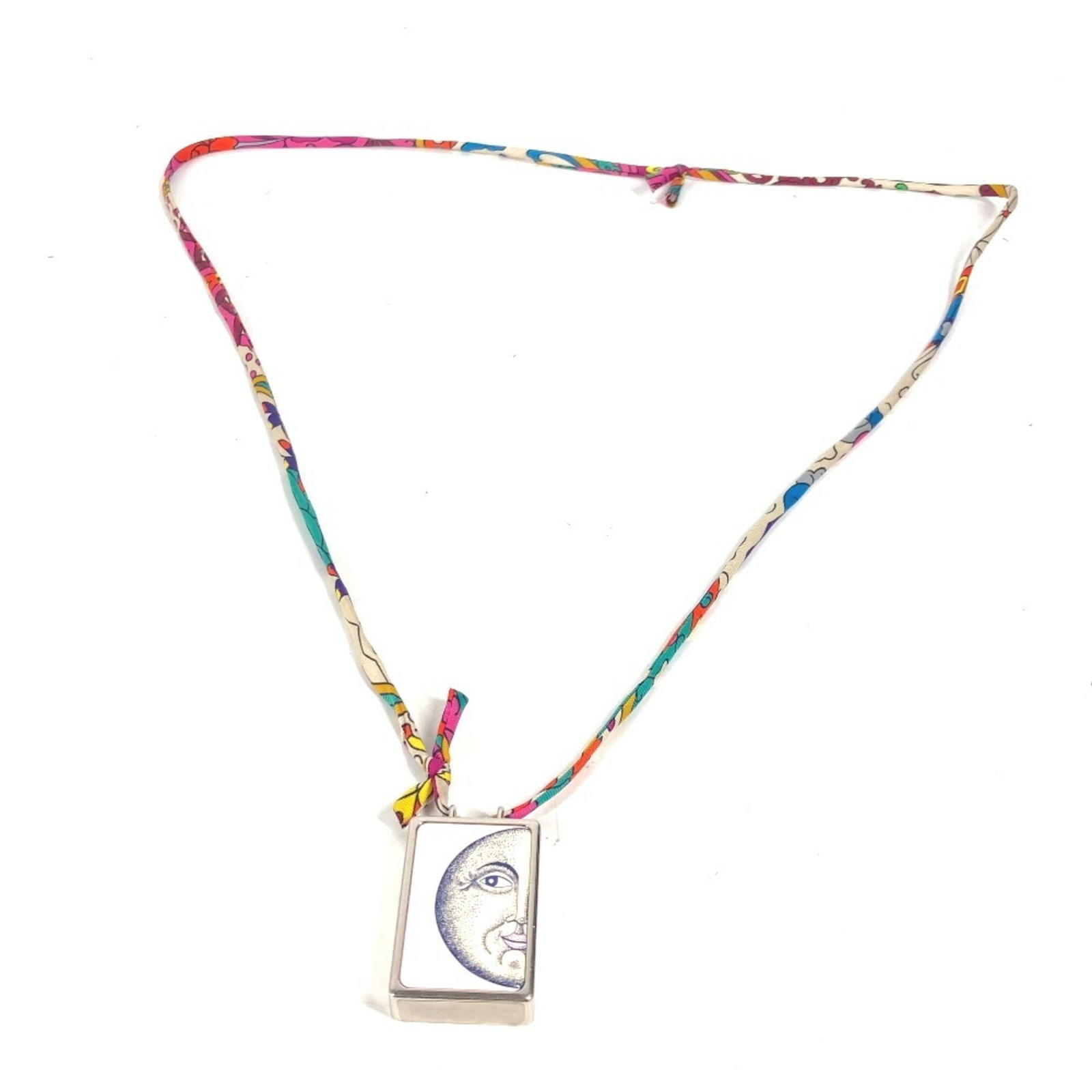 HERMES Metal Silk: HERMES Metal Silk Silver Metal Silk Hermes Necklace with Multi-color Design, 51 cm Circumference. This gently used necklace features a unique multi-color design made from metal and silk, set against