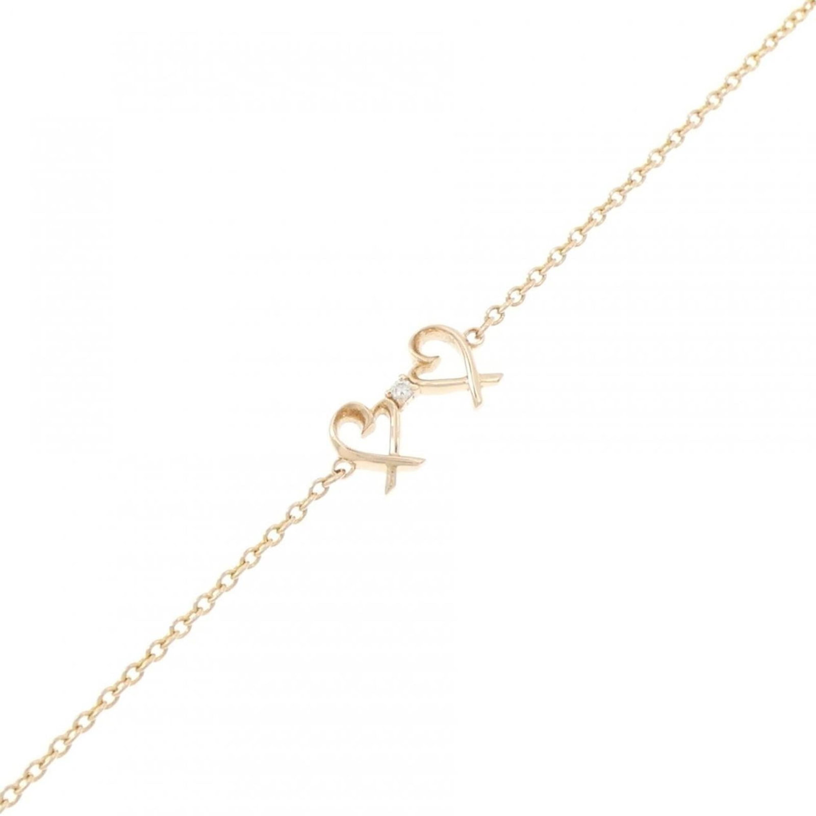 TIFFANY Charm Bracelet Pink Gold (18K): TIFFANY Charm Bracelet Pink Gold (18K) Pink gold (18K) charm bracelet from Tiffany, featuring a delicate pink gold (18K) charm bracelet with a length of 16.5cm / 6.49''. This like new used bracelet