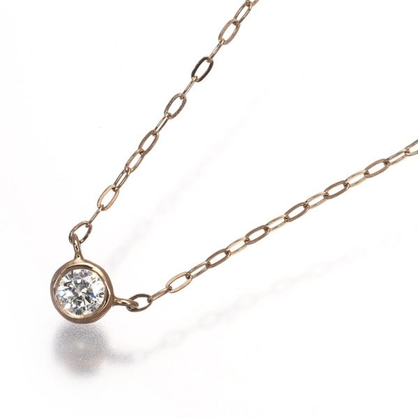 Necklace Diamond Bezel Solitaire 18K 750 Rose Gold: Necklace Diamond Bezel Solitaire 18K 750 Rose Gold 18k rose gold necklace features a stunning natural diamond solitaire pendant. The diamond's diameter is approximately 2.5mm, and the necklace itself
