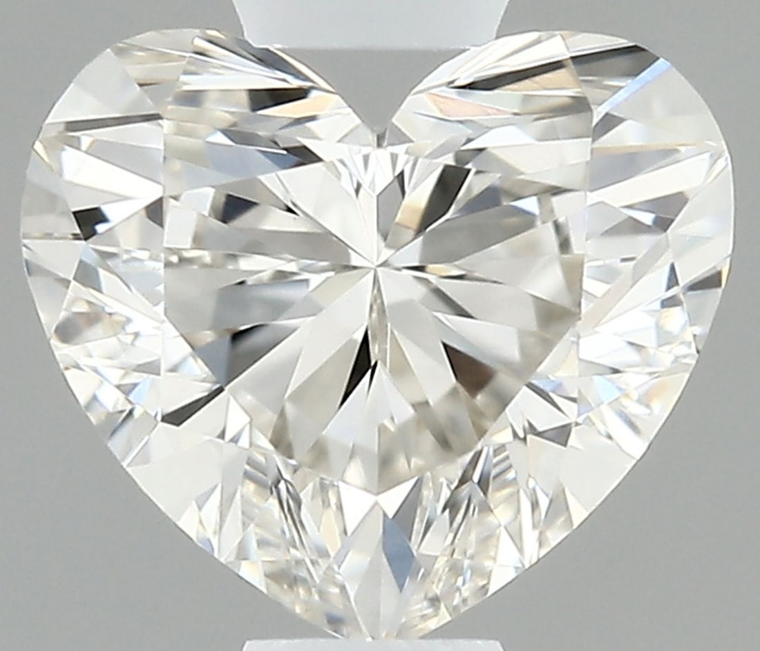 IGI Heart 0.53ct H VVS2 - Loose Natural Diamond: IGI Heart 0.53ct H VVS2 - Loose Natural Diamond 0.53ct H VVS2 - Loose Natural Diamond, certified by the International Gemological Institute (IGI), boasts exceptional clarity and polish, with an EX