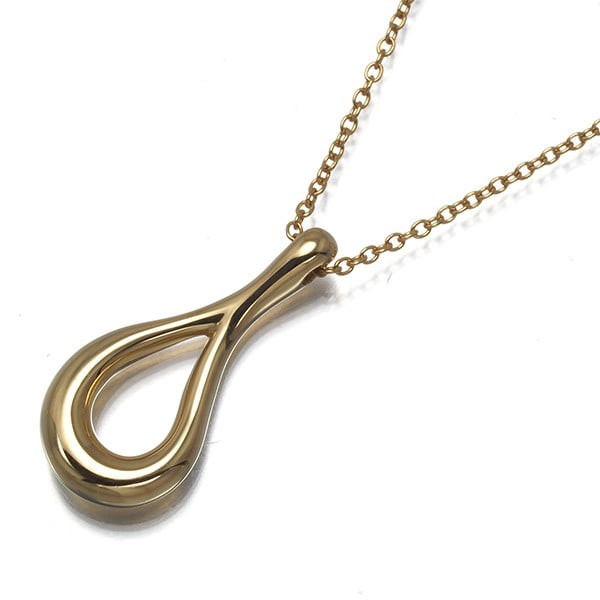 Tiffany&Co. Necklace Open Teardrop 18K 750 Yellow Gold: Tiffany&Co. Necklace Open Teardrop 18K 750 Yellow Gold Tiffany & Co.'s Open Teardrop necklace is a stunning 18k yellow gold piece, featuring a signature design by Elsa Peretti. This elegant pendant is