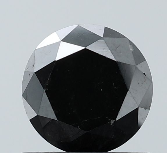 Round 0.93ct Black VVS2 - Loose Natural Diamond: Round 0.93ct Black VVS2 - Loose Natural Diamond Round 0.93ct Black VVS2 - Loose Natural Diamond. This rare black diamond boasts exceptional clarity, cut, and color, making it a standout among its