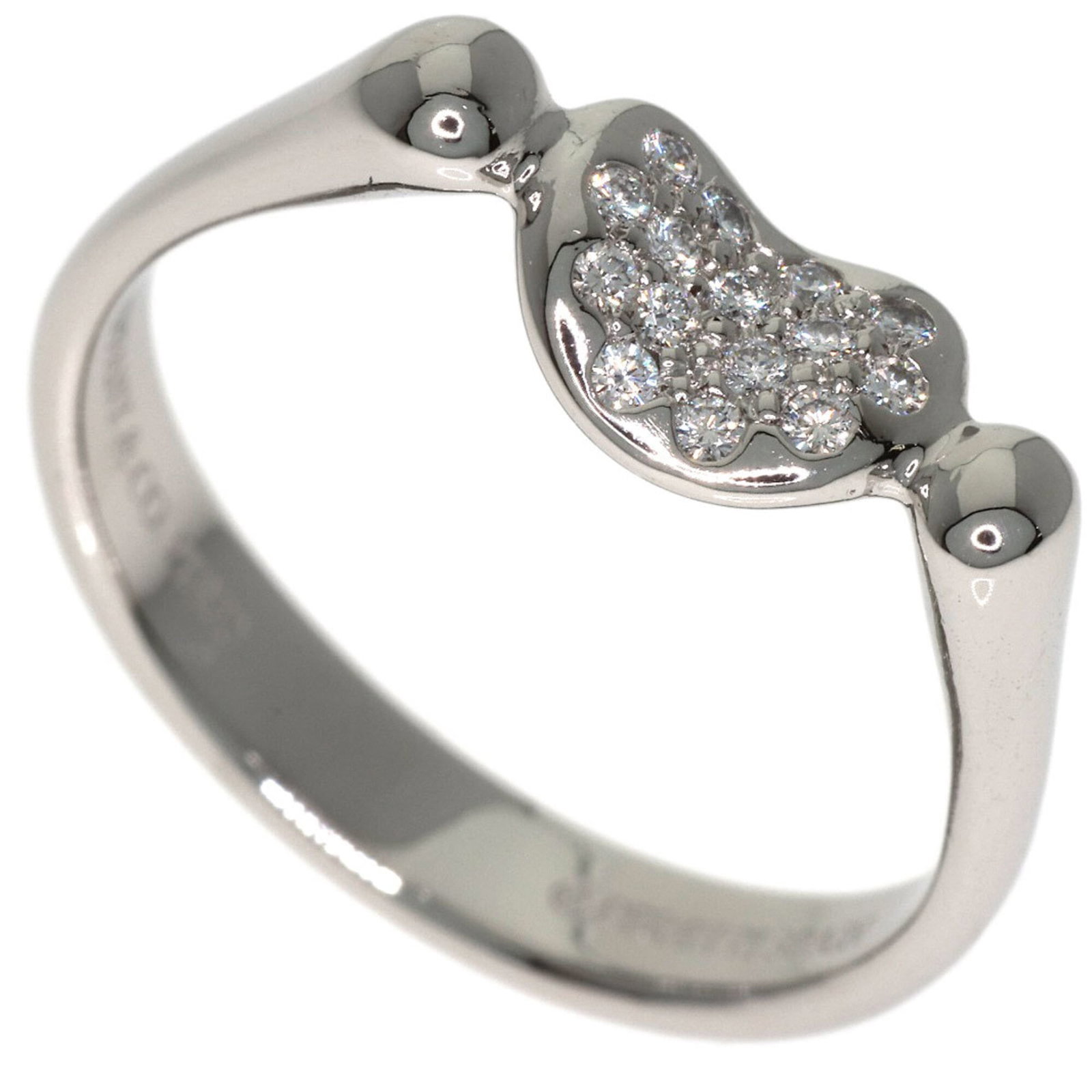 TIFFANY Band Ring Platinum 950: TIFFANY Band Ring Platinum 950 Platinum 950 Tiffany Band Ring with Diamond Stone. This gently used band ring features a diamond stone set in platinum 950, a high-quality metal alloy. The ring is in ve