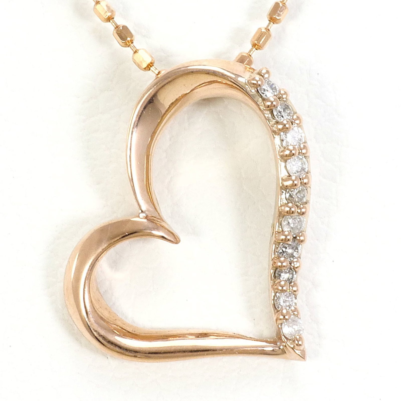 Pink Gold (10K): Pink Gold (10K) Pink gold (10K) necklace featuring a 0.05ct diamond pendant, crafted from 10K gold with a pink gold tone, and available in a 40cm length. The necklace is in like new condition, with