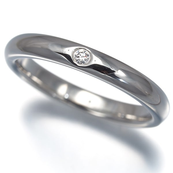 Tiffany&Co. Ring Diamond Stacking Band 1P Us5 Pt 950: Tiffany&Co. Ring Diamond Stacking Band 1P Us5 Pt 950 Tiffany & Co.'s Stacking Band by Elsa Peretti is a sleek and modern design, showcasing a natural diamond set in platinum. The band's 950 platinum p