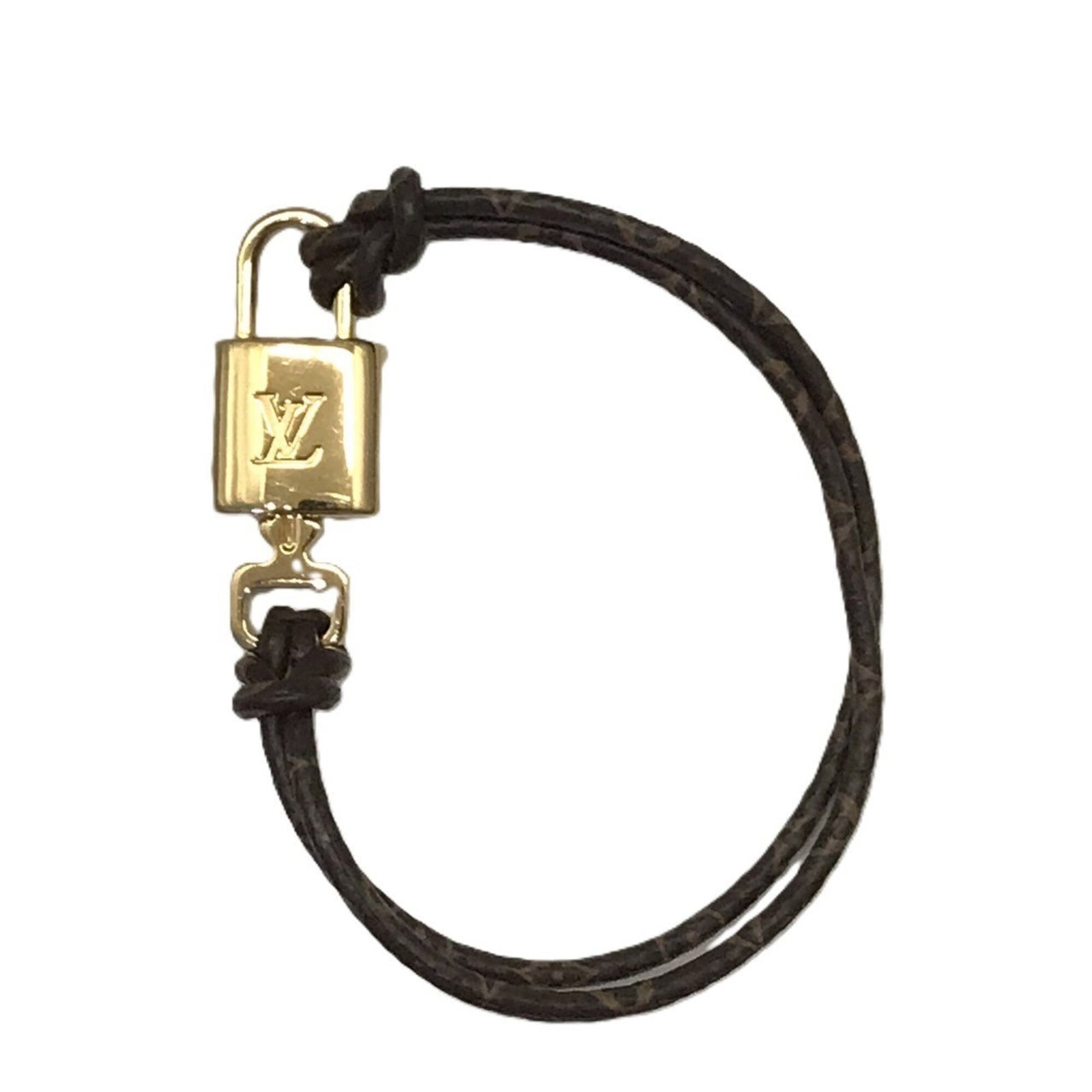 LOUIS VUITTON Charm Bracelet Brown Gold: LOUIS VUITTON Charm Bracelet Brown Gold Brown Gold Charm Bracelet from Louis Vuitton, a classic accessory with visible scratches and scuffs, offering a unique, pre-owned charm. Made from brown gold,