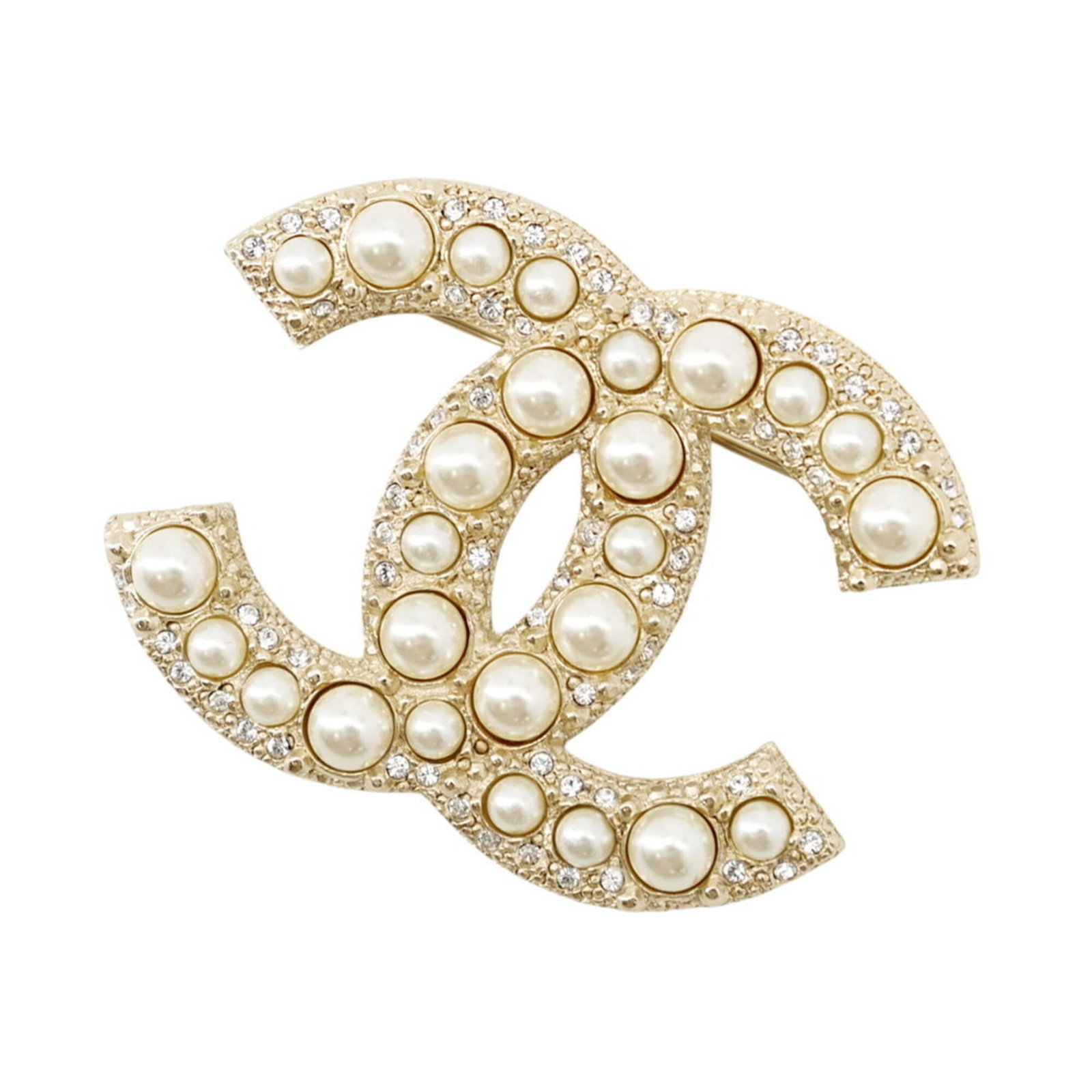 CHANEL Brooch Metal: CHANEL Brooch Metal Champagne gold metal brooch from CHANEL, crafted in France, features a rhinestone stone and measures 3.7cm x 4.8cm. In like new condition, this brooch boasts excellent preservation