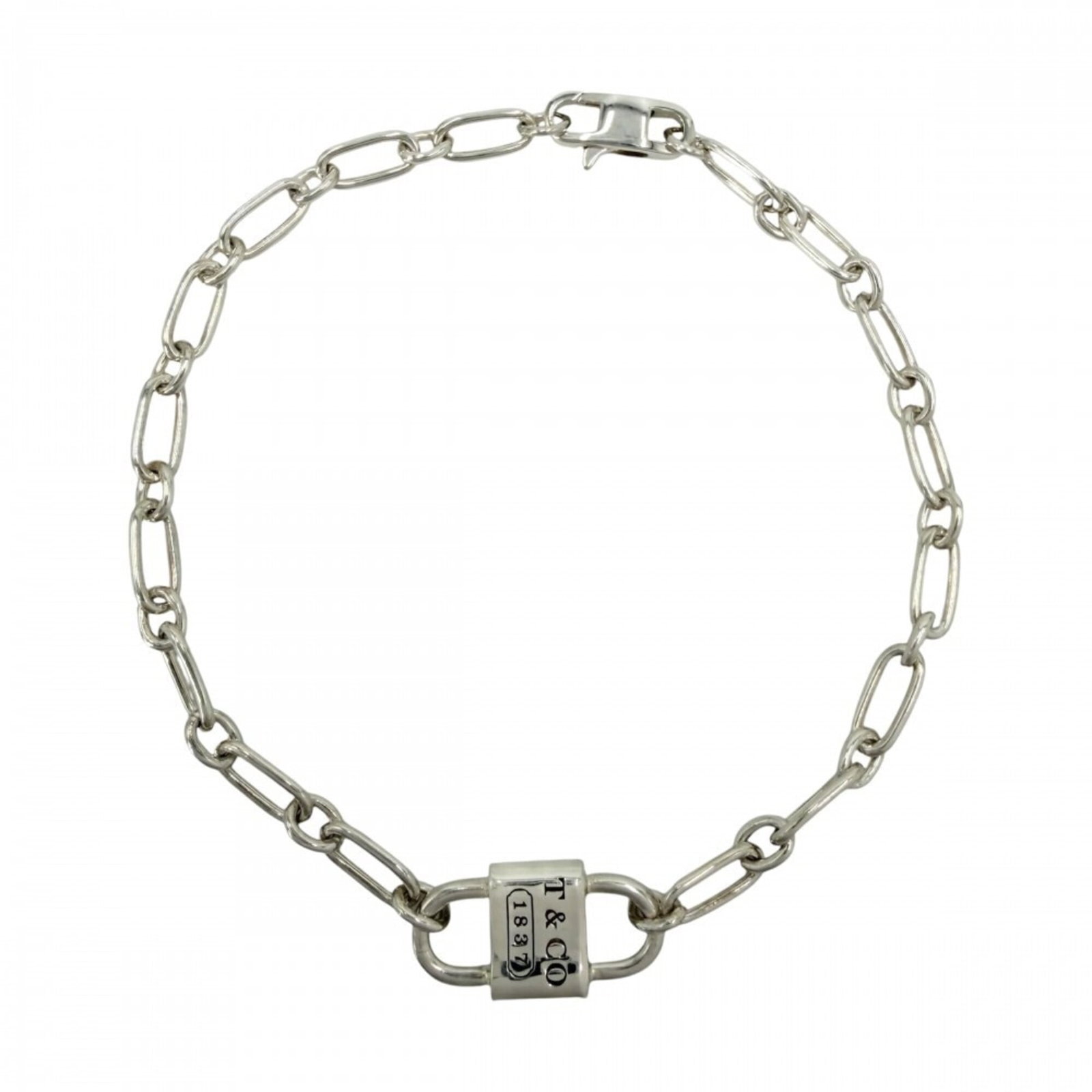 TIFFANY Charm Bracelet Silver 925: TIFFANY Charm Bracelet Silver 925 Silver 925 Tiffany Charm Bracelet, 19cm / 7.48'' in length, bearing visible scratches and scuffs. This charm bracelet is made from sterling silver and features a clas