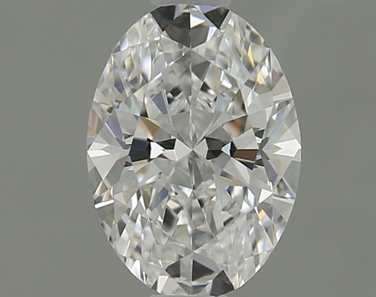 GIA Oval 0.71ct E VVS2 - Loose Natural Diamond: GIA Oval 0.71ct E VVS2 - Loose Natural Diamond GIA Oval 0.71ct E VVS2 - Loose Natural Diamond. This exceptional diamond boasts a vibrant E color, exceptional clarity of VVS2, and impressive EX polish 