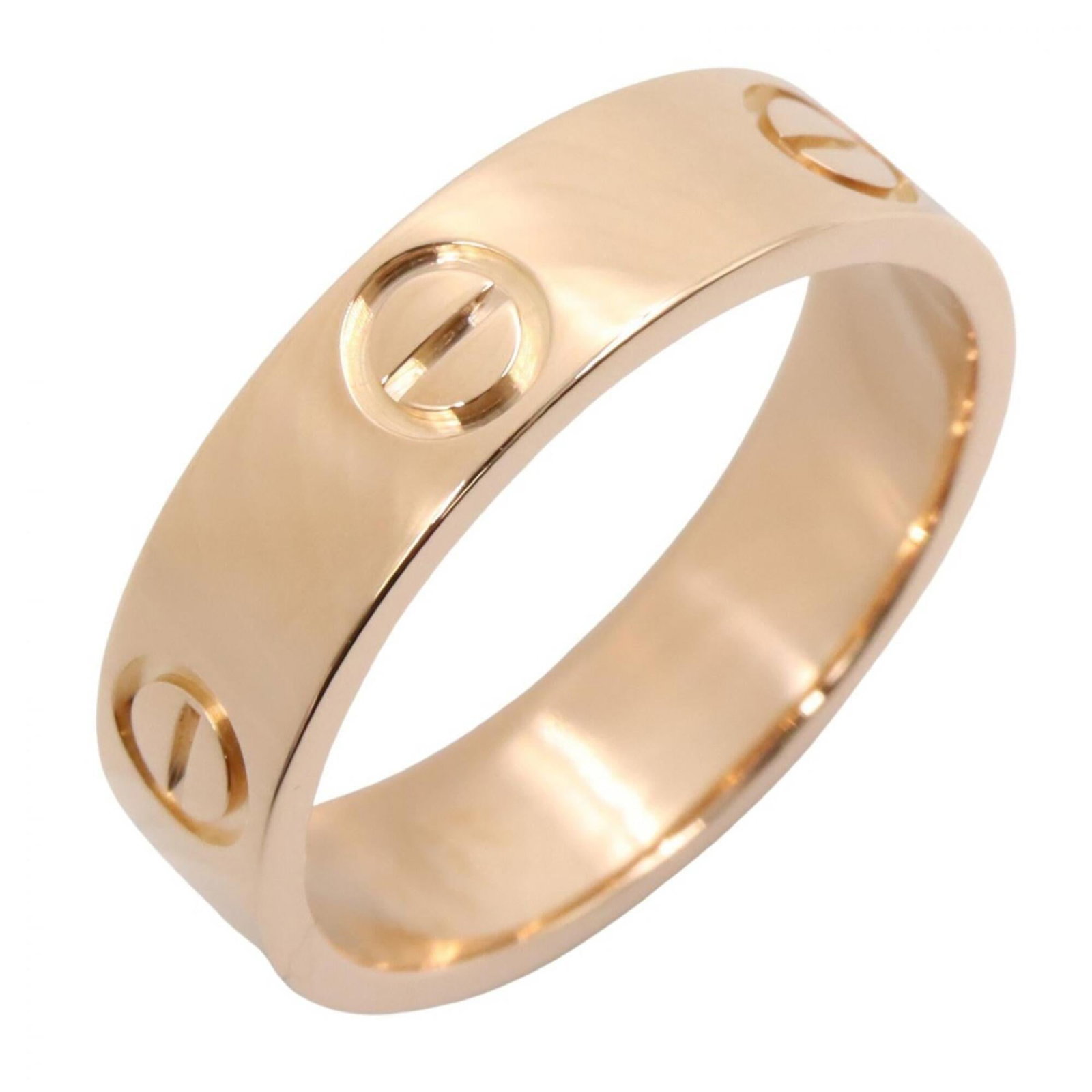CARTIER Band Ring Pink: CARTIER Band Ring Pink The Cartier Band Ring in pink gold is a timeless piece, featuring a 5mm wide band with a 18K gold construction. This gently used ring bears minor signs of wear, including small