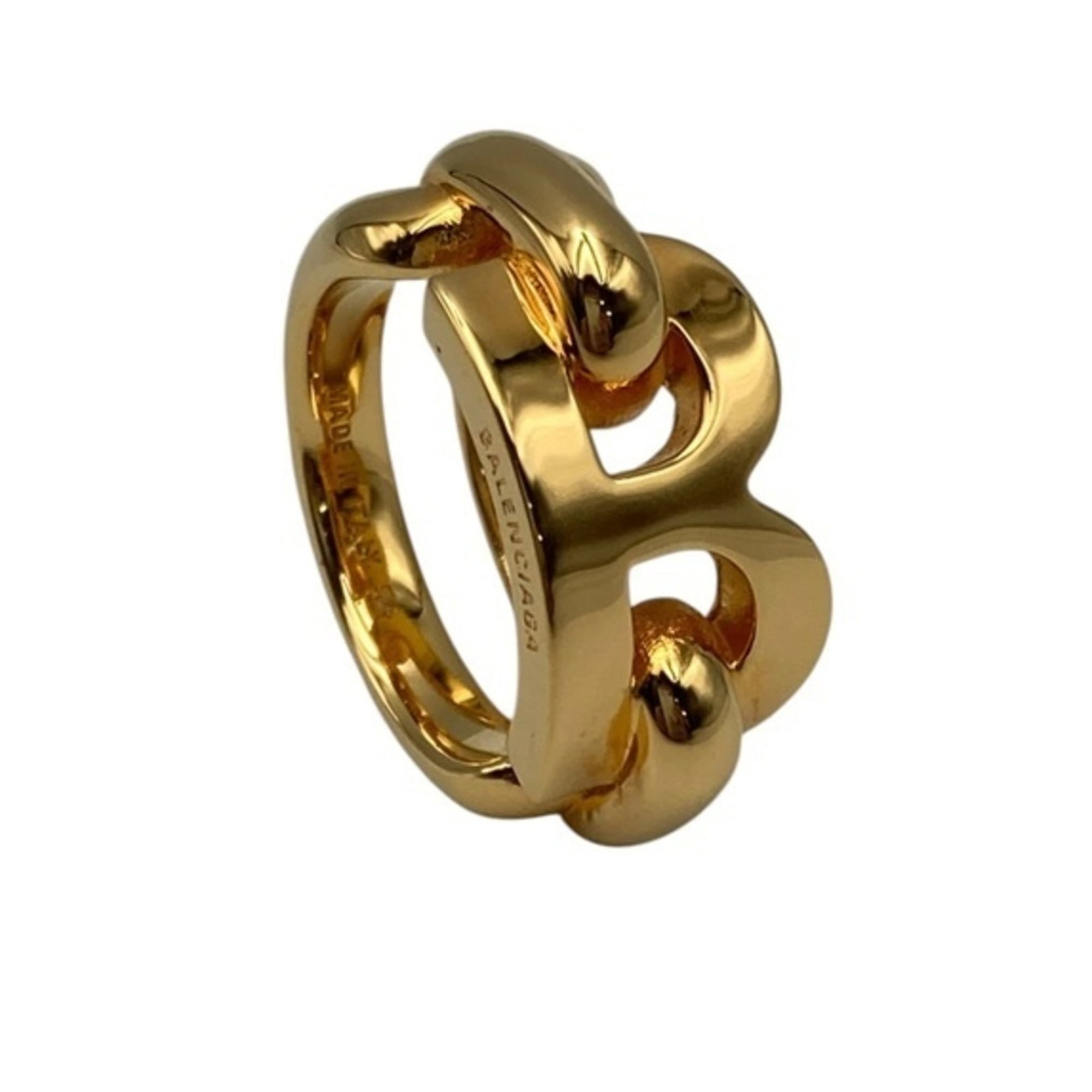 BALENCIAGA Band Ring Brass: BALENCIAGA Band Ring Brass Brass band ring from Balenciaga, Italy, featuring a classic design with a gold finish. The ring bears a signature, a hallmark of the brand's attention to detail. Gently used
