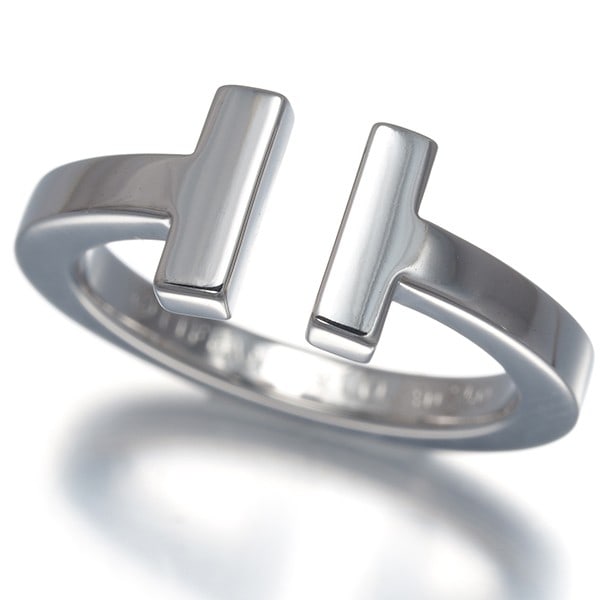 Tiffany&Co. Ring Tiffany T Square Us5 18K 750 White Gold: Tiffany&Co. Ring Tiffany T Square Us5 18K 750 White Gold Tiffany & Co.'s iconic Tiffany T Square Ring is a timeless design. Made from 18k white gold, this ring boasts a sleek 7.8mm width and a comfort