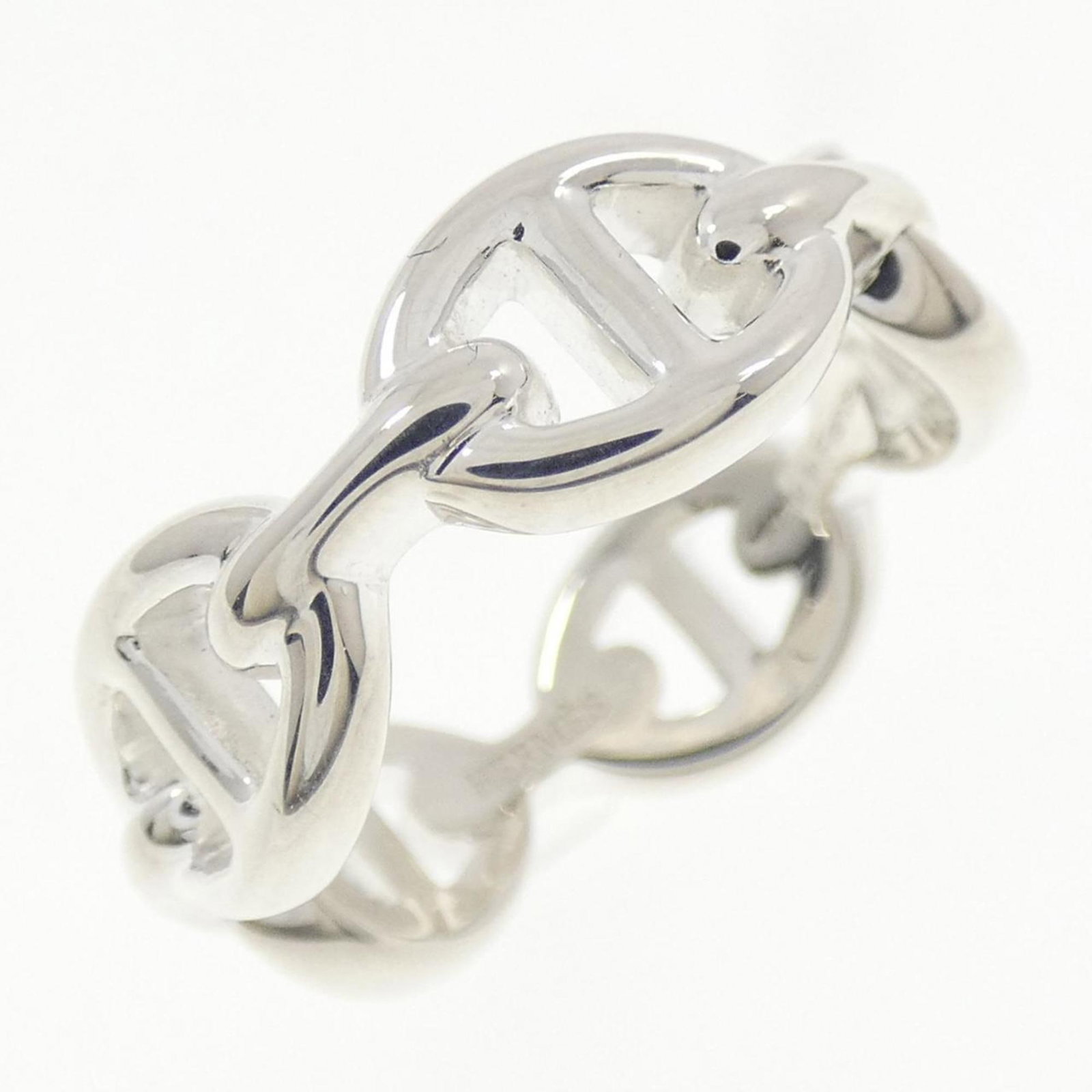 HERMES Band Ring Silver 925: HERMES Band Ring Silver 925 Silver 925 band ring from Hermes, a high-quality accessory featuring a sleek design. The item is gently used with minor signs of wear, including small scratches or light ma