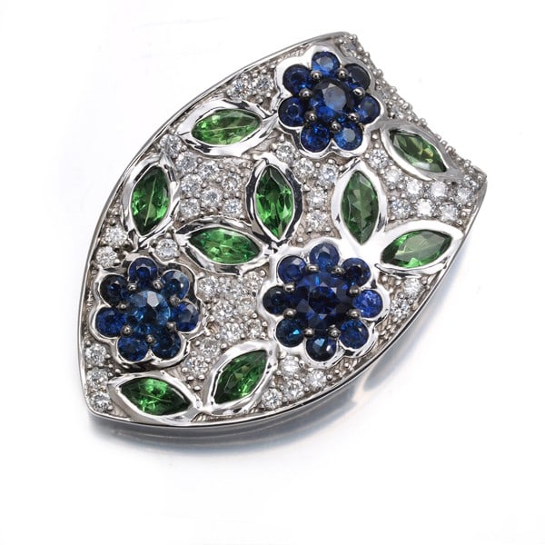 Gstv Pendant Green Garnet Sapphire Diamond Flower Paved 18K Wg: Gstv Pendant Green Garnet Sapphire Diamond Flower Paved 18K Wg 18k White Gold Pendant Features a Stunning Green Garnet, Sapphire, and Diamond Combination. The natural design showcases a 0.70ct green g