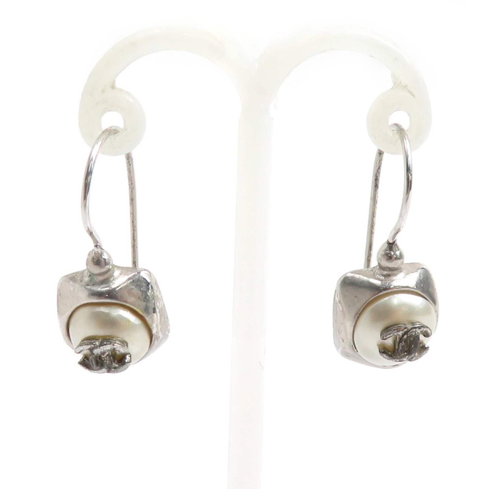 CHANEL Drop Earrings Artificial Pearl Metal: CHANEL Drop Earrings Artificial Pearl Metal Artificial pearl and metal drop earrings from CHANEL, featuring an off-white and silver finish. Made in France, these earrings showcase a classic design wit