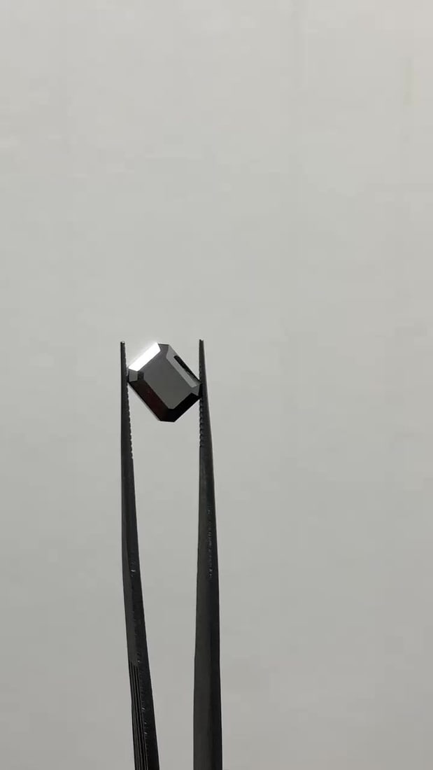 GIA Emerald 5.4ct Fancy Black VVS2 - Loose Natural Diamond: GIA Emerald 5.4ct Fancy Black VVS2 - Loose Natural Diamond 5.4ct Fancy Black Emerald Cut Diamond with Excellent Cut, Clarity, Polish, and Symmetry. This GIA-certified diamond boasts exceptional clarit